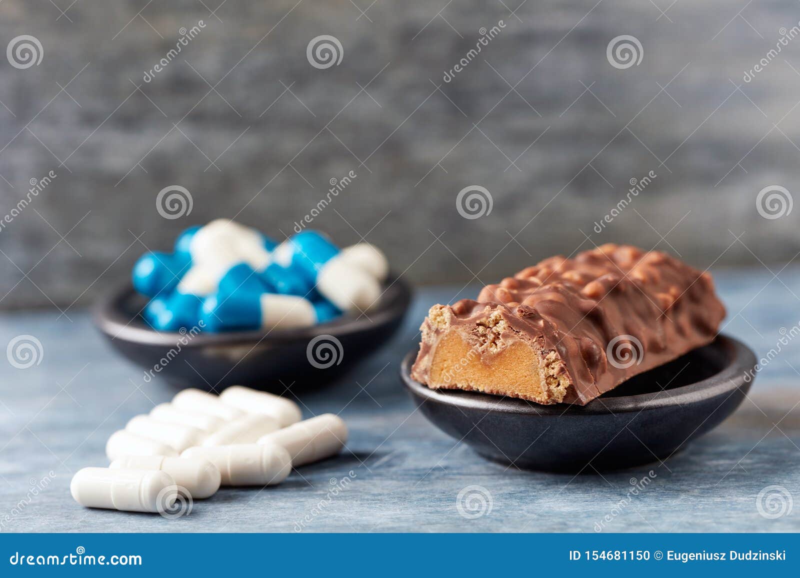 high protein bar, tri-creatine malate and beta-alanine capsules.