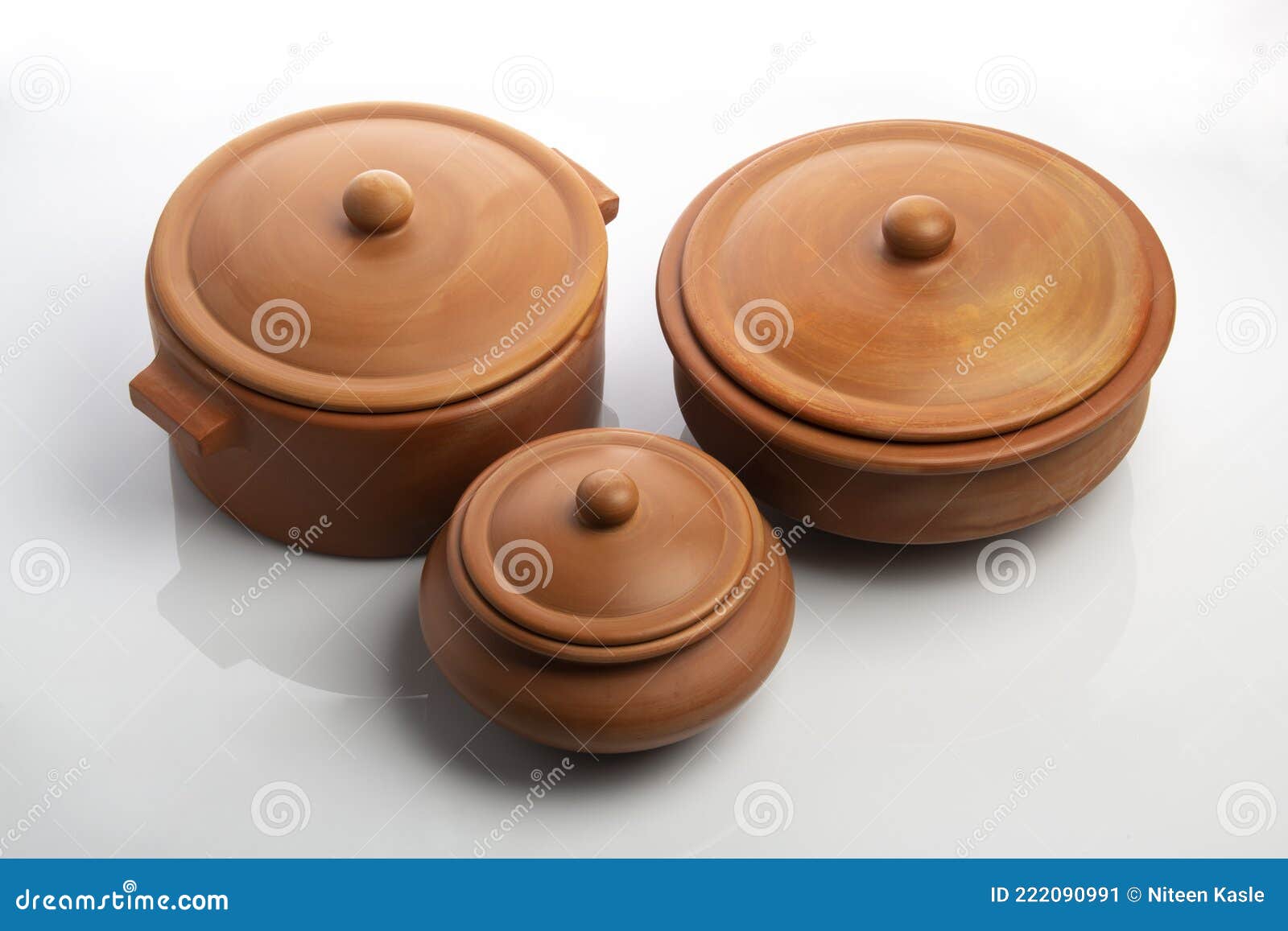 front view of earthen pots  on white background
