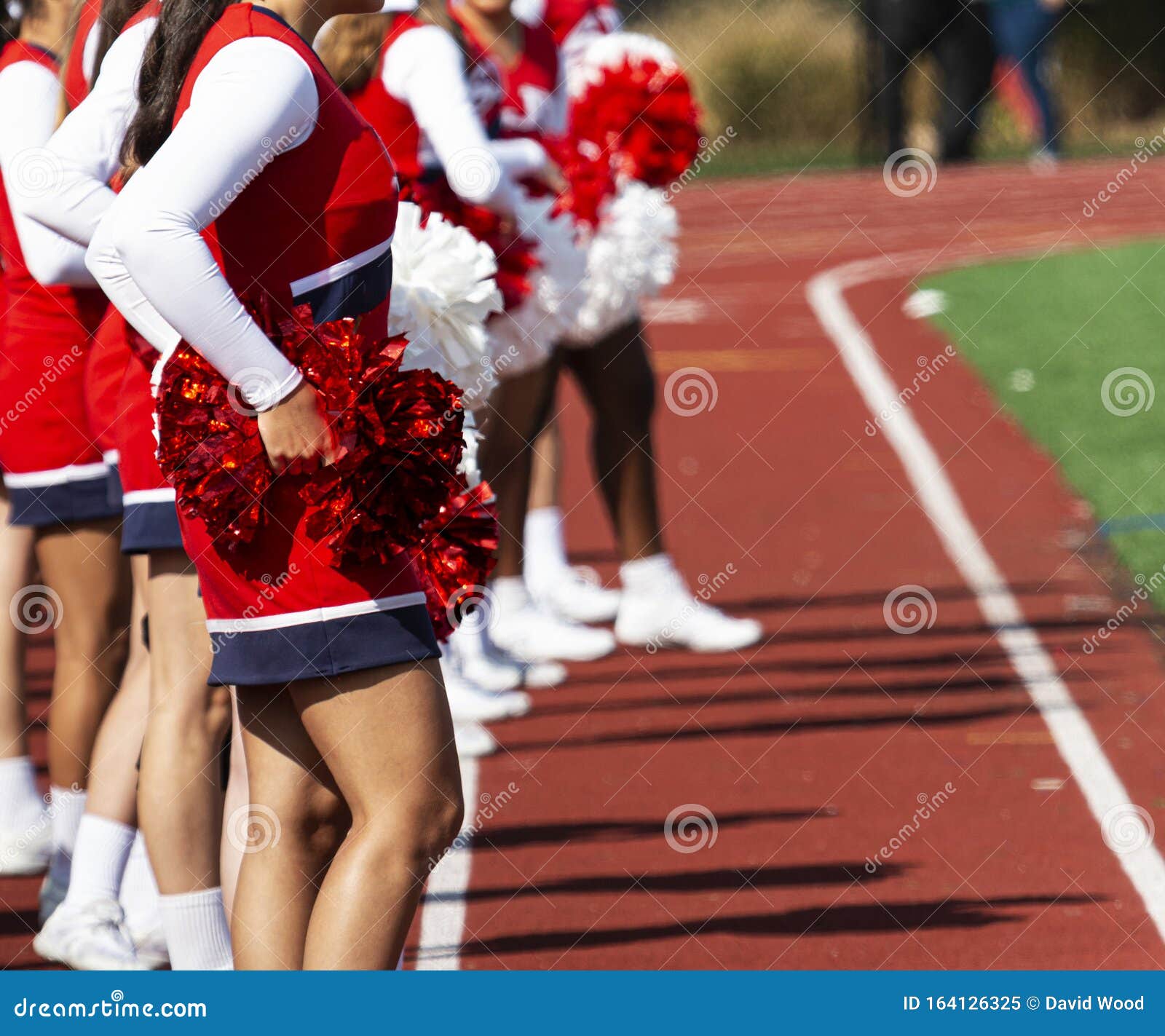 Cheerleaders on the Track during a Football Game Image - Image of football, practice: