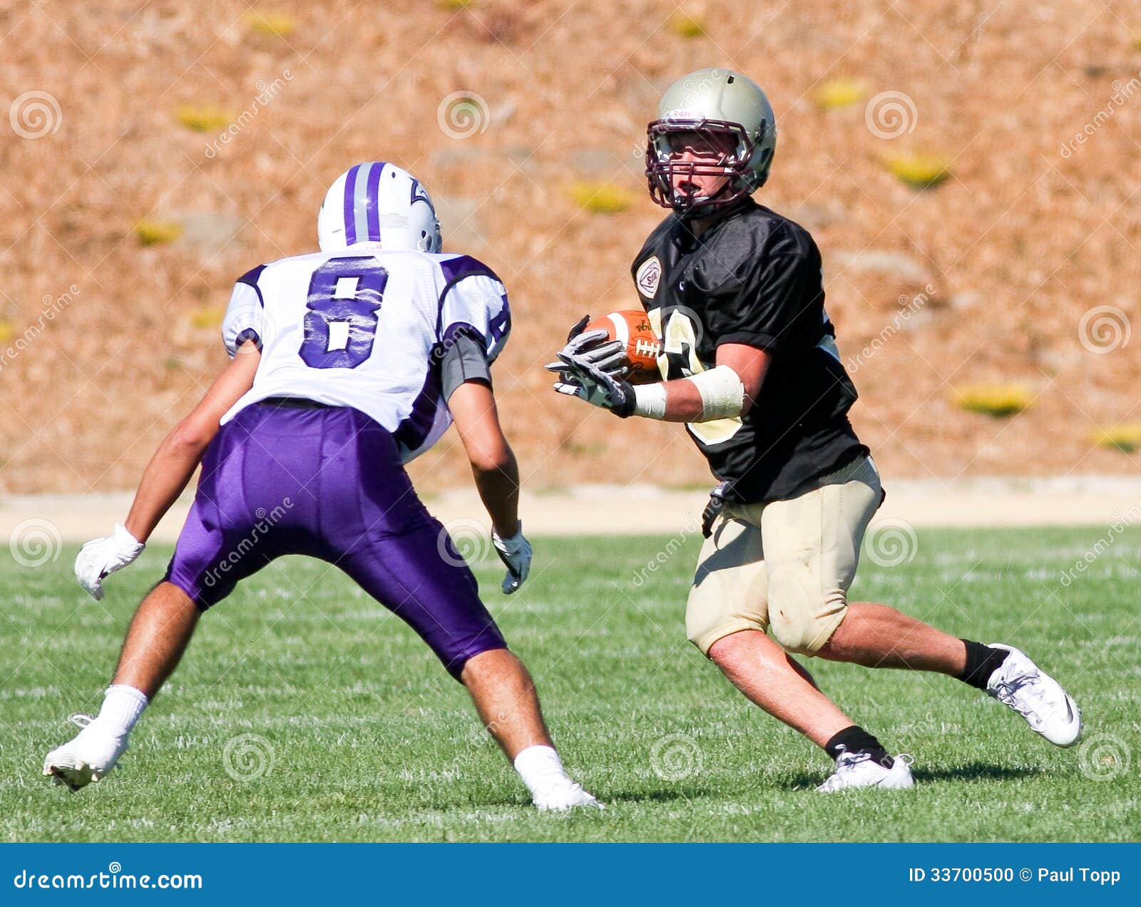 High School Football Player Running with the Ball during a Game ...