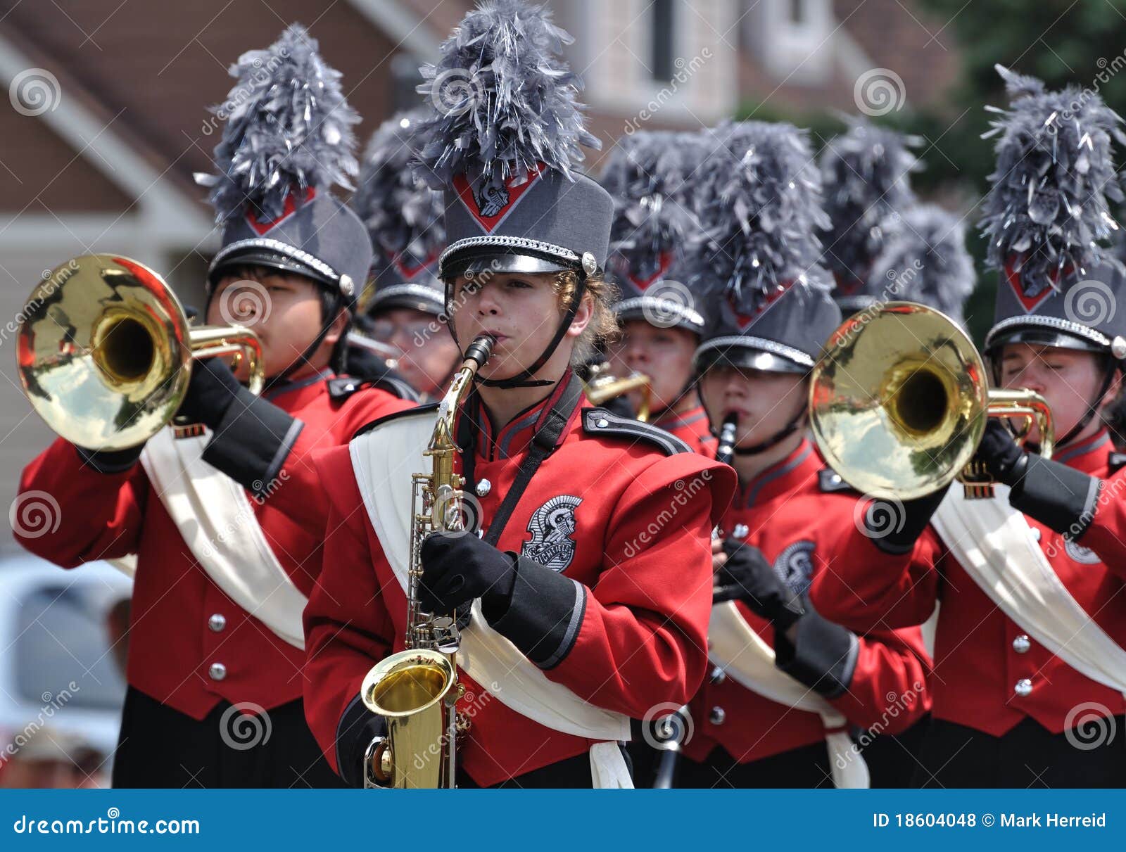 High School Marching Band Performing in Parade Editorial Stock Photo