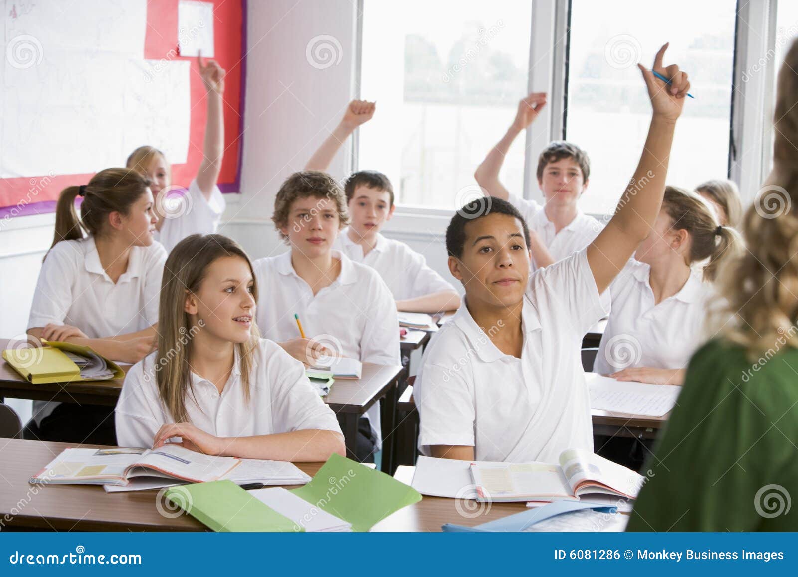 high school students answering a question