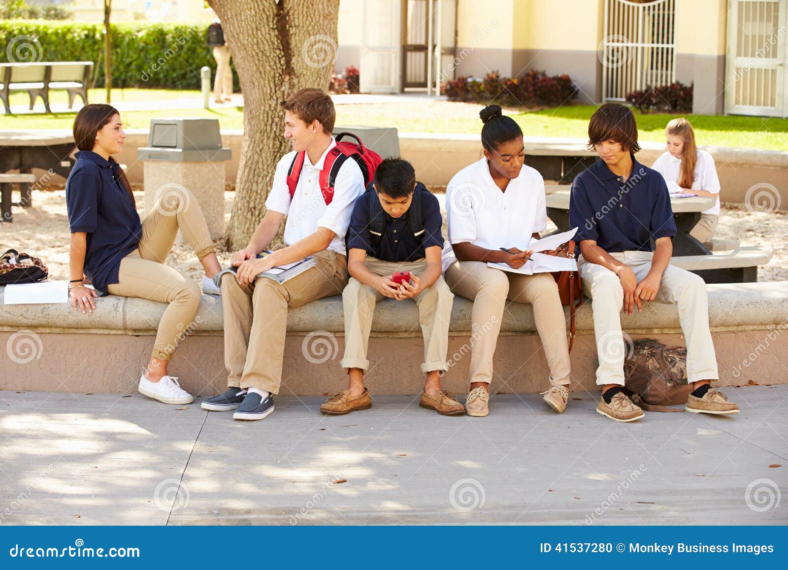 High School Students Hanging Out On School Campus Stock Photo - Image