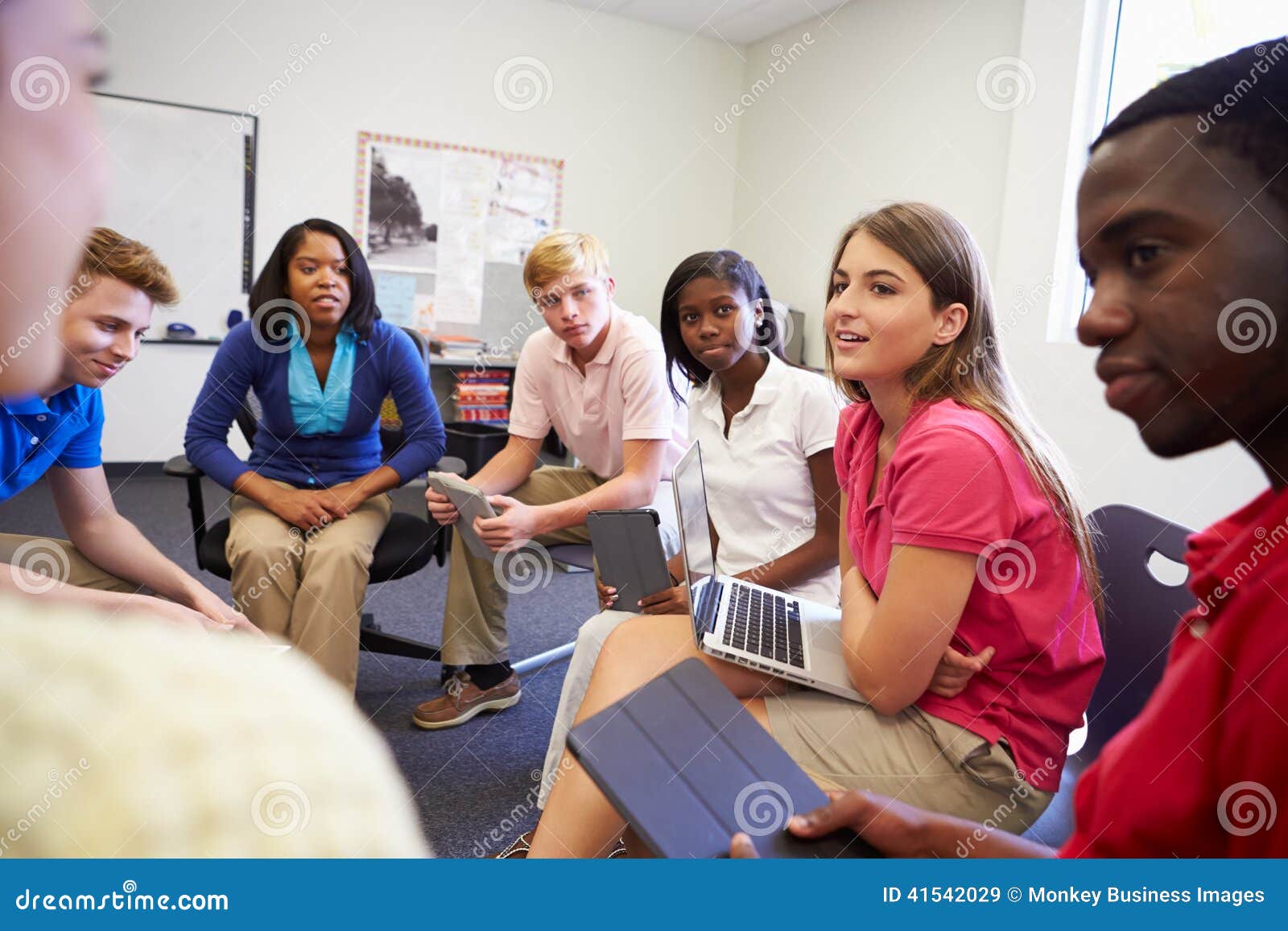 high school students taking part in group discussi