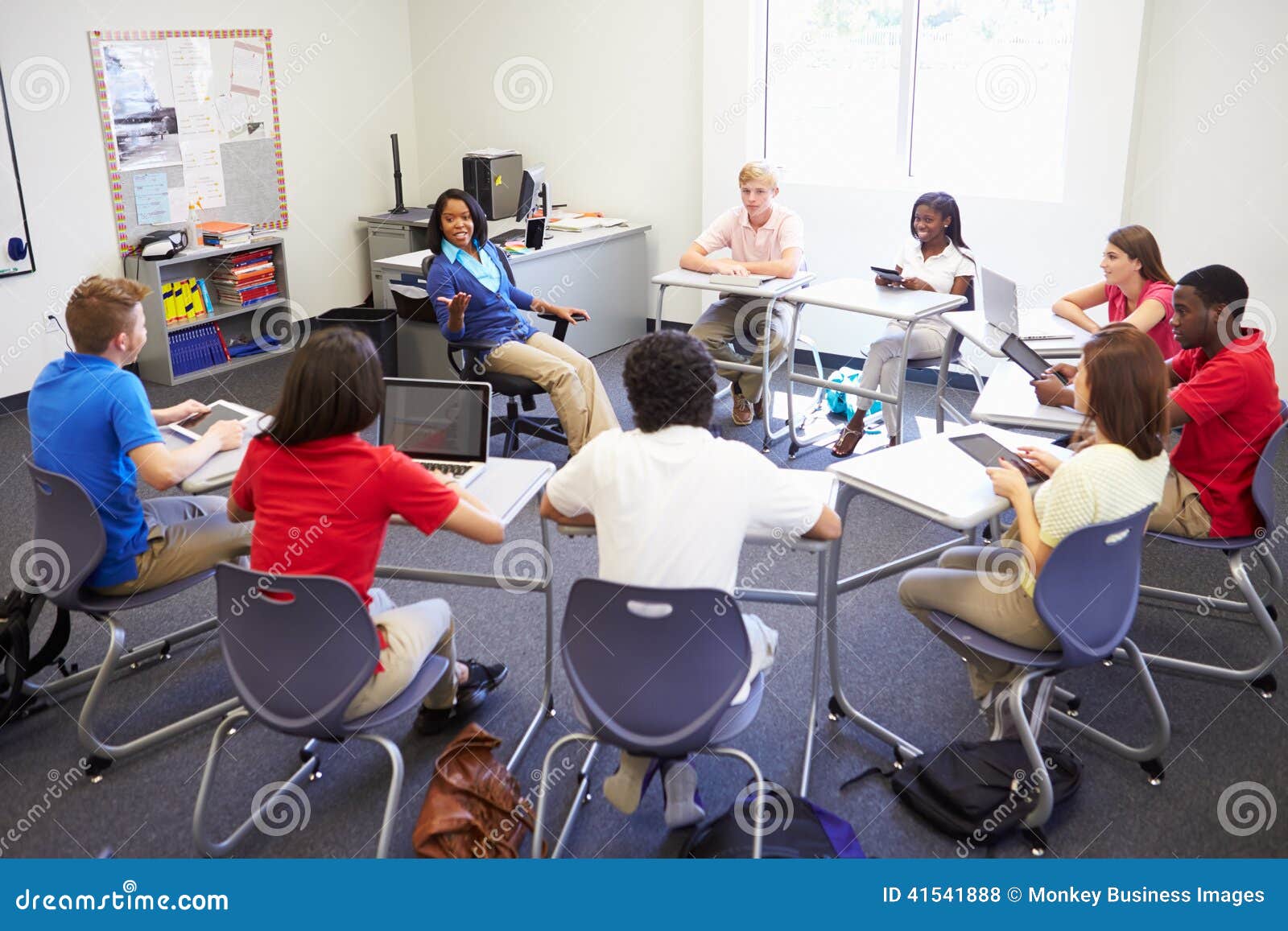 high school students taking part in group discussi