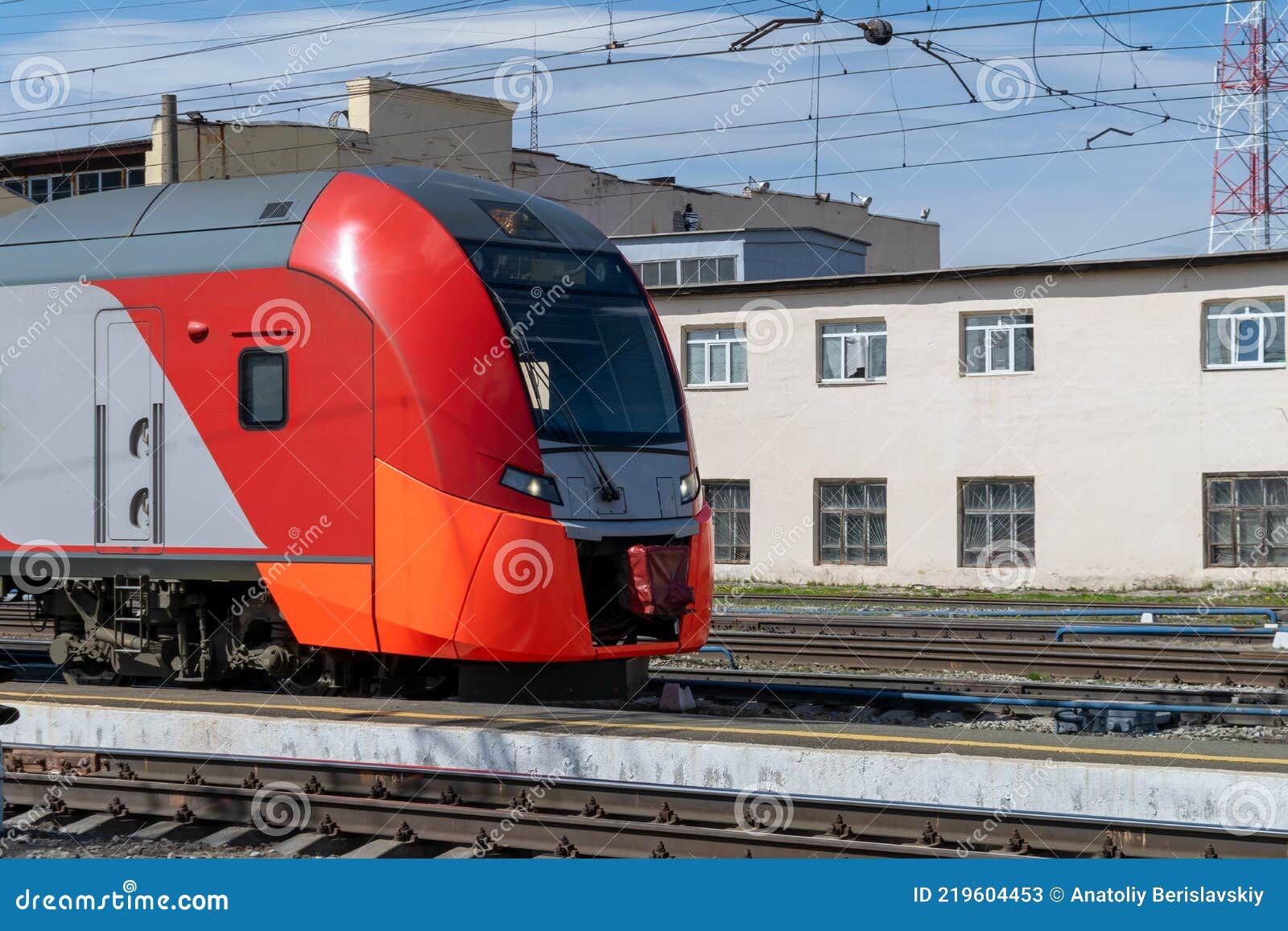 Highspeed Passenger Electric Train on the Platform Closeup Editorial