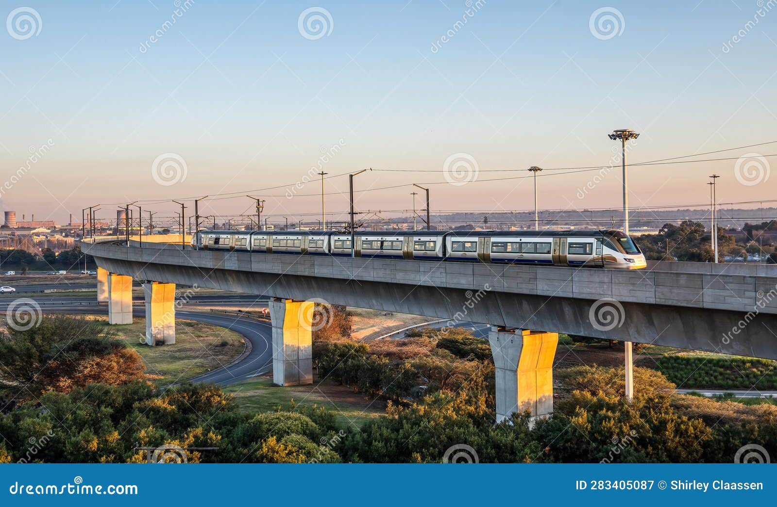 high speed train on a raised railway track