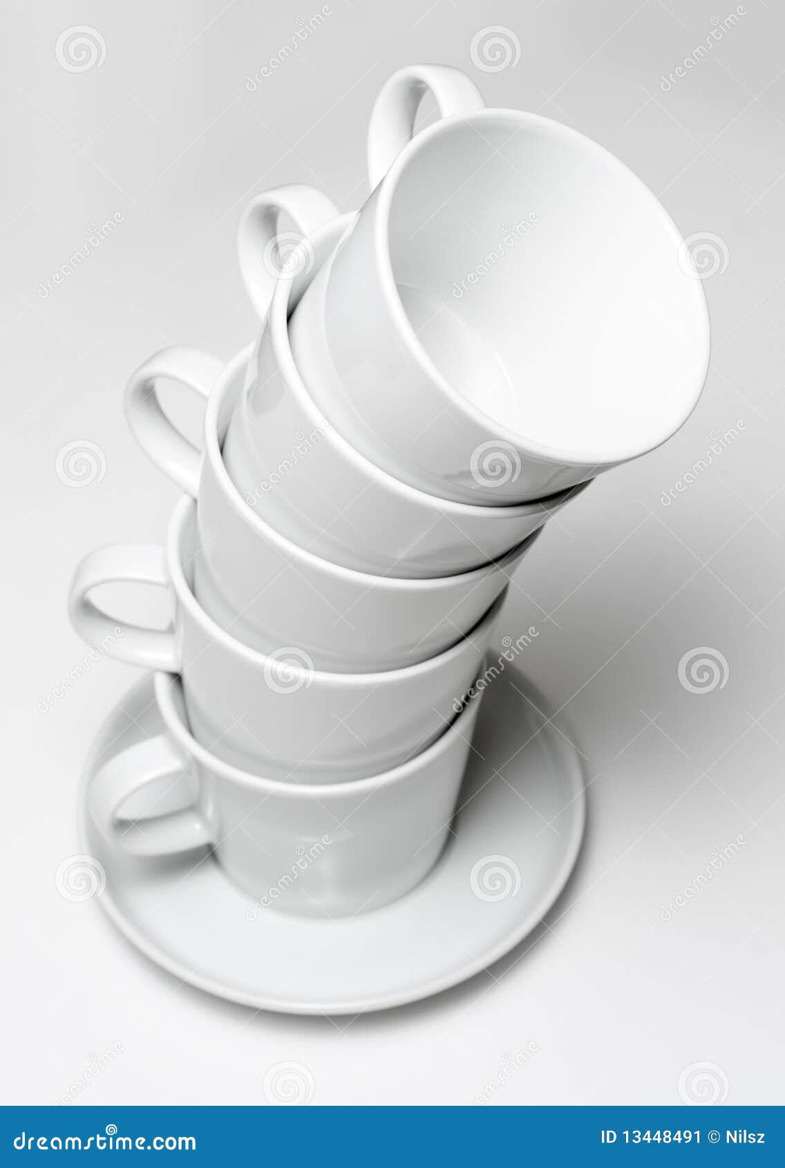 high stack of coffeecup tableware