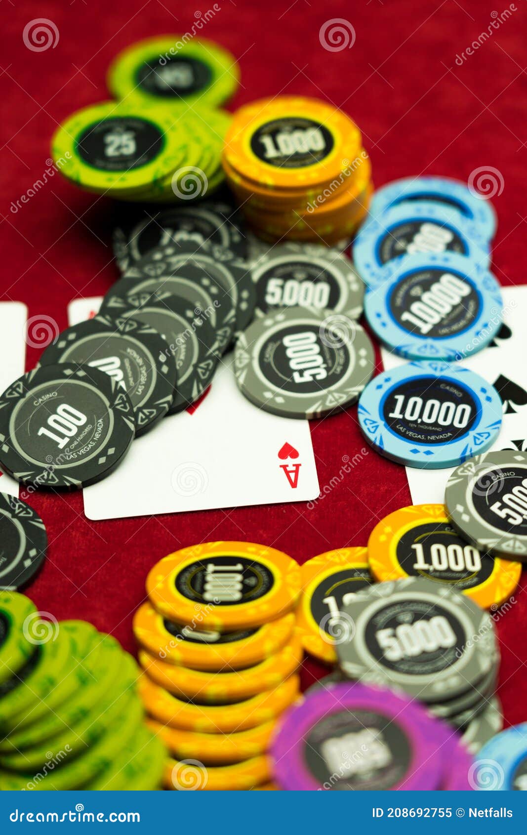 high-stakes-poker-game-texas-hold-em-red-felt-casino-208692755.jpg