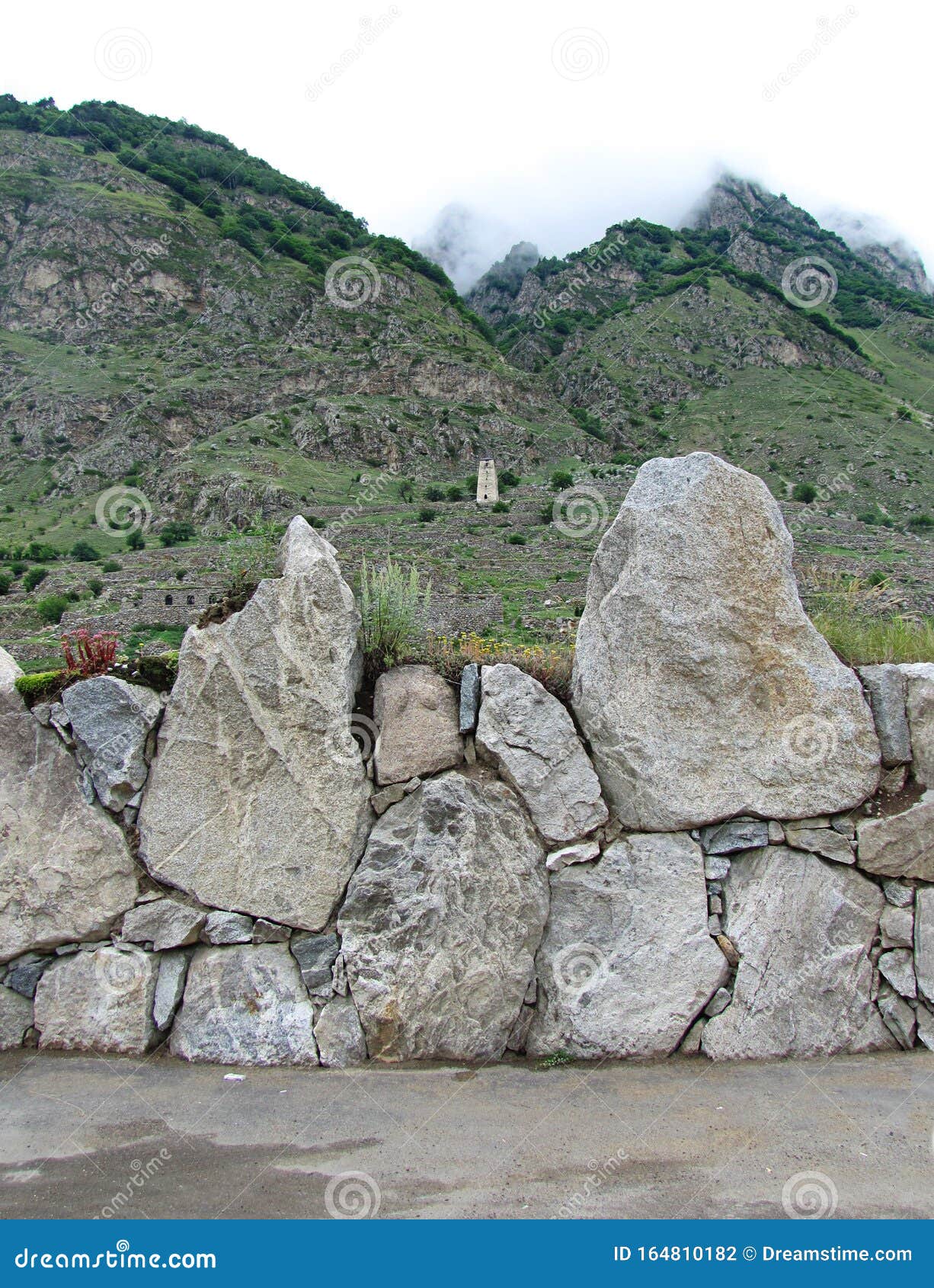 A High Stone Fence Made of Very Large Stones Enclosing an Ancient