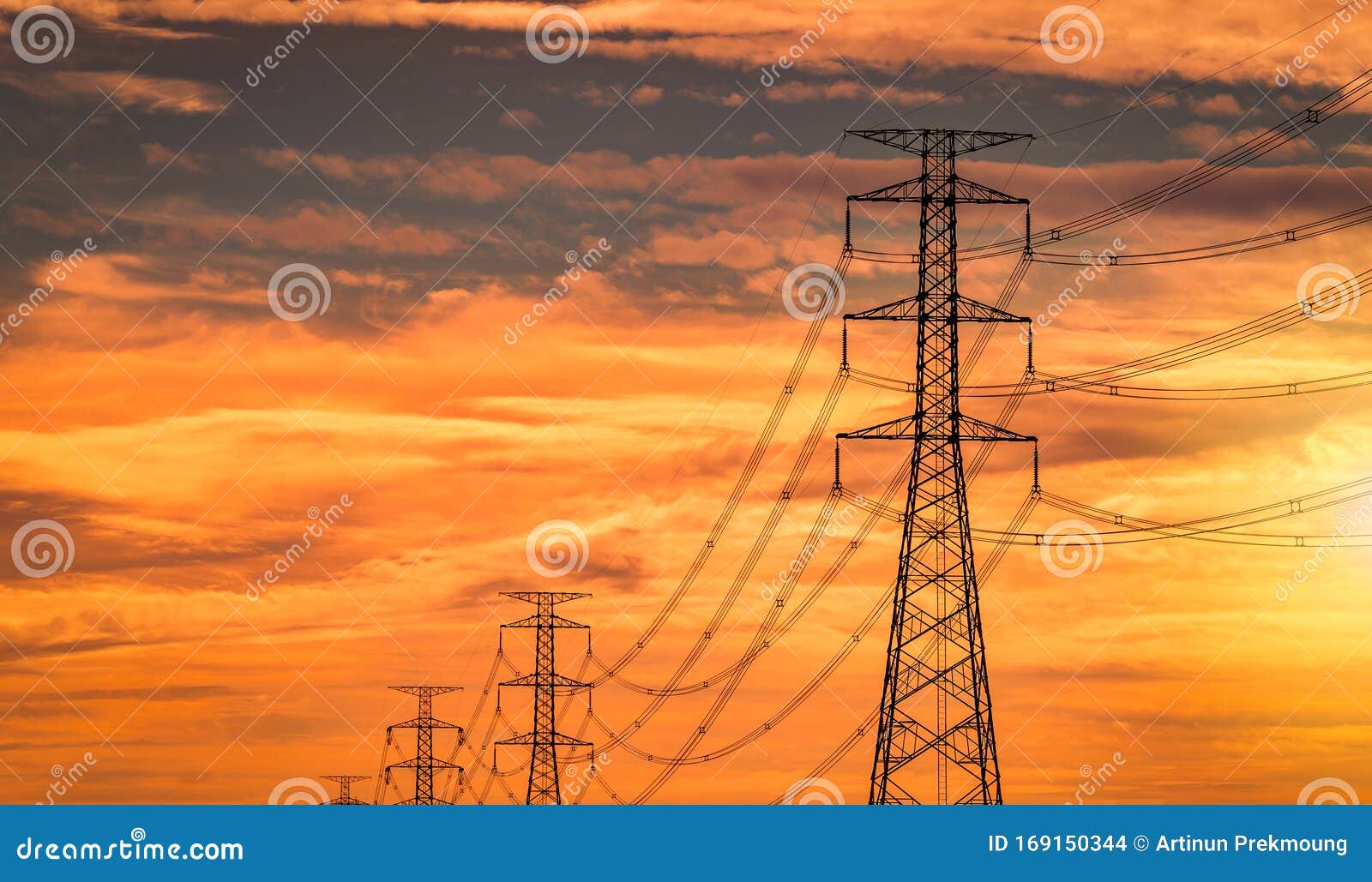 High Voltage Electric Pole and Transmission Line in the Evening