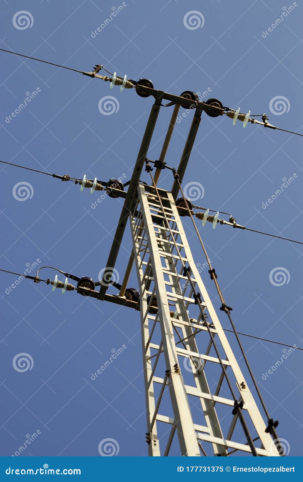 high voltage electric tower with sky in the background
