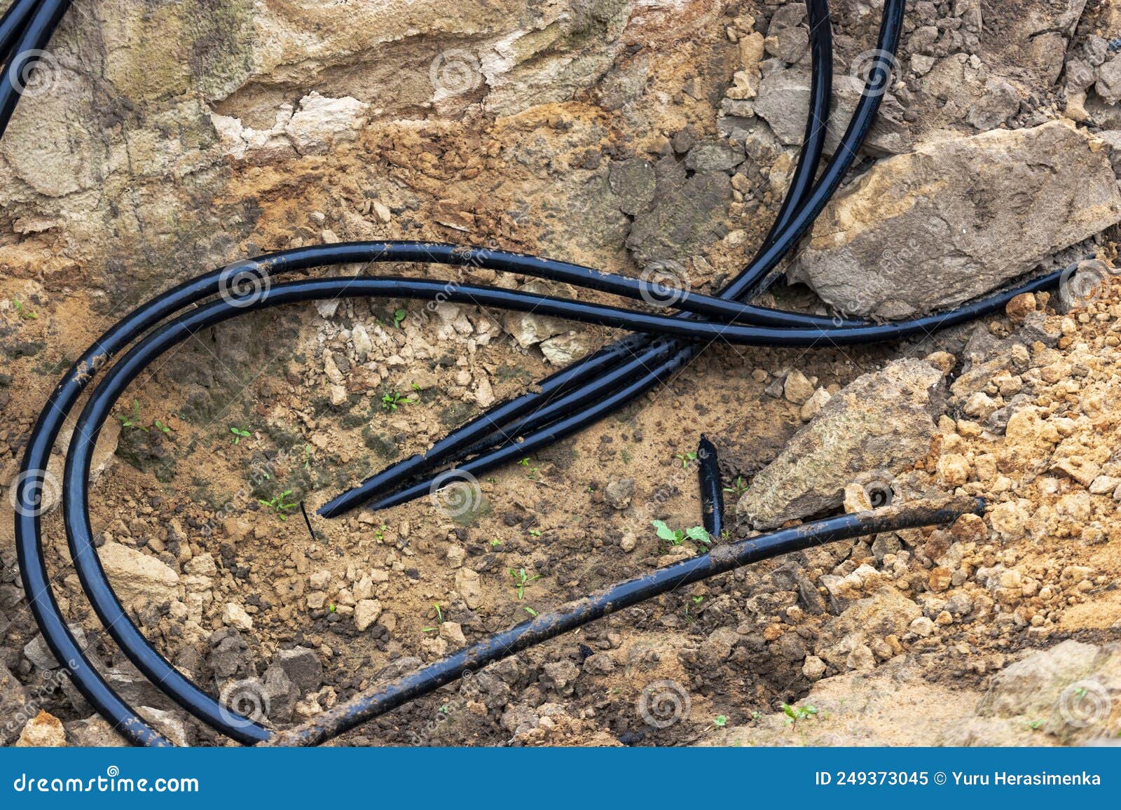 The High Voltage Electrical Cable is Laid in a Trench Under Existing