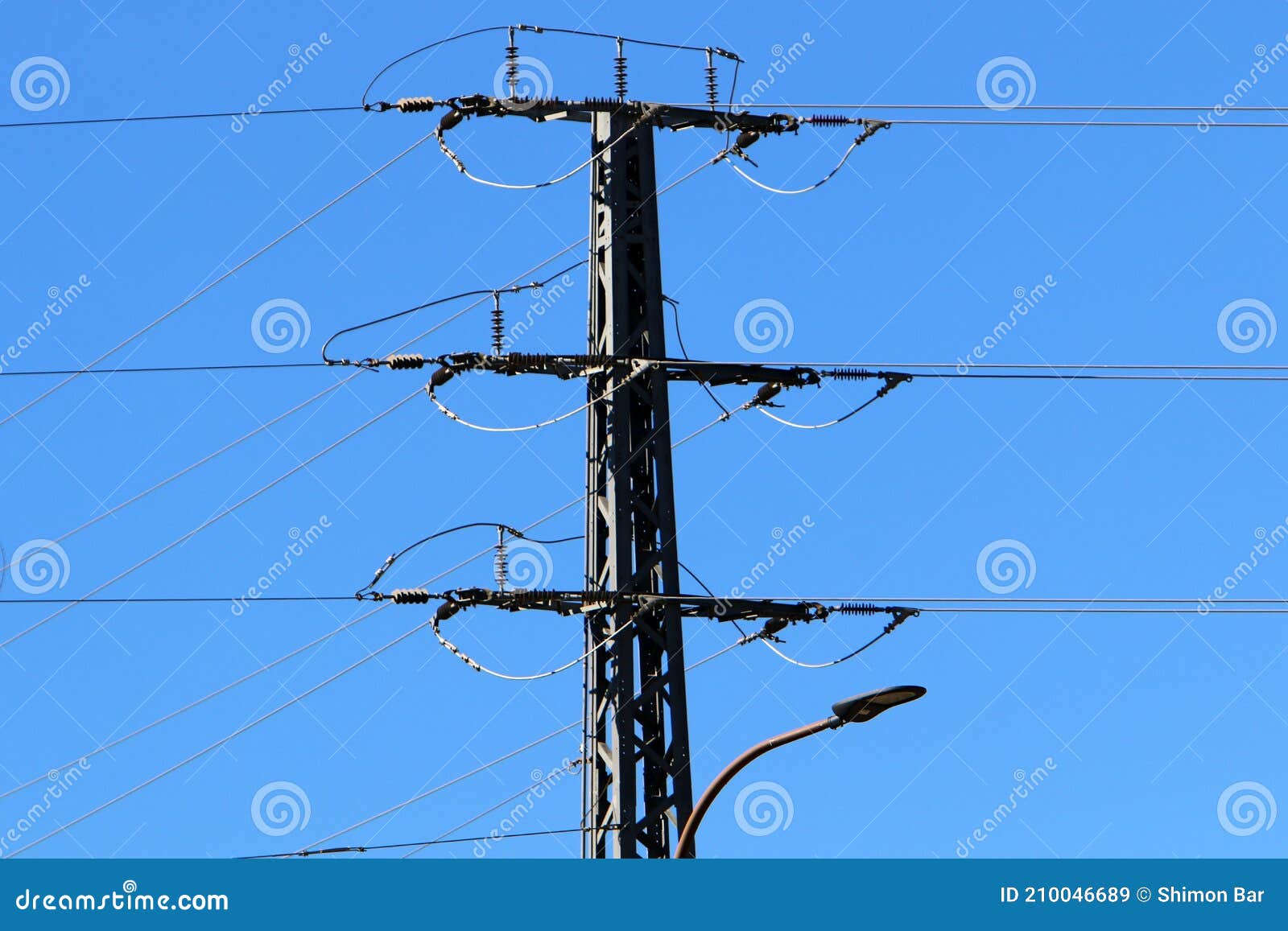 High Voltage Power Lines through Fields and Mountains in Israel Stock