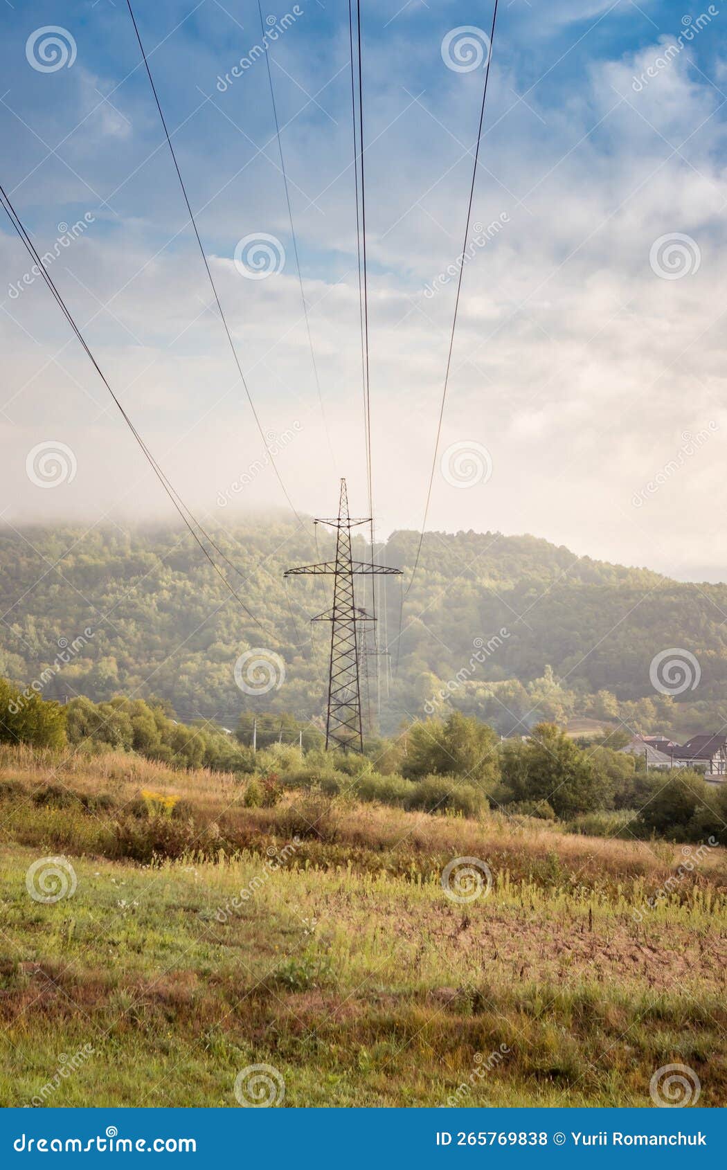 high voltage, power transmission line on the mountain range. overhead power line in the mountains. metal poles of power lines in