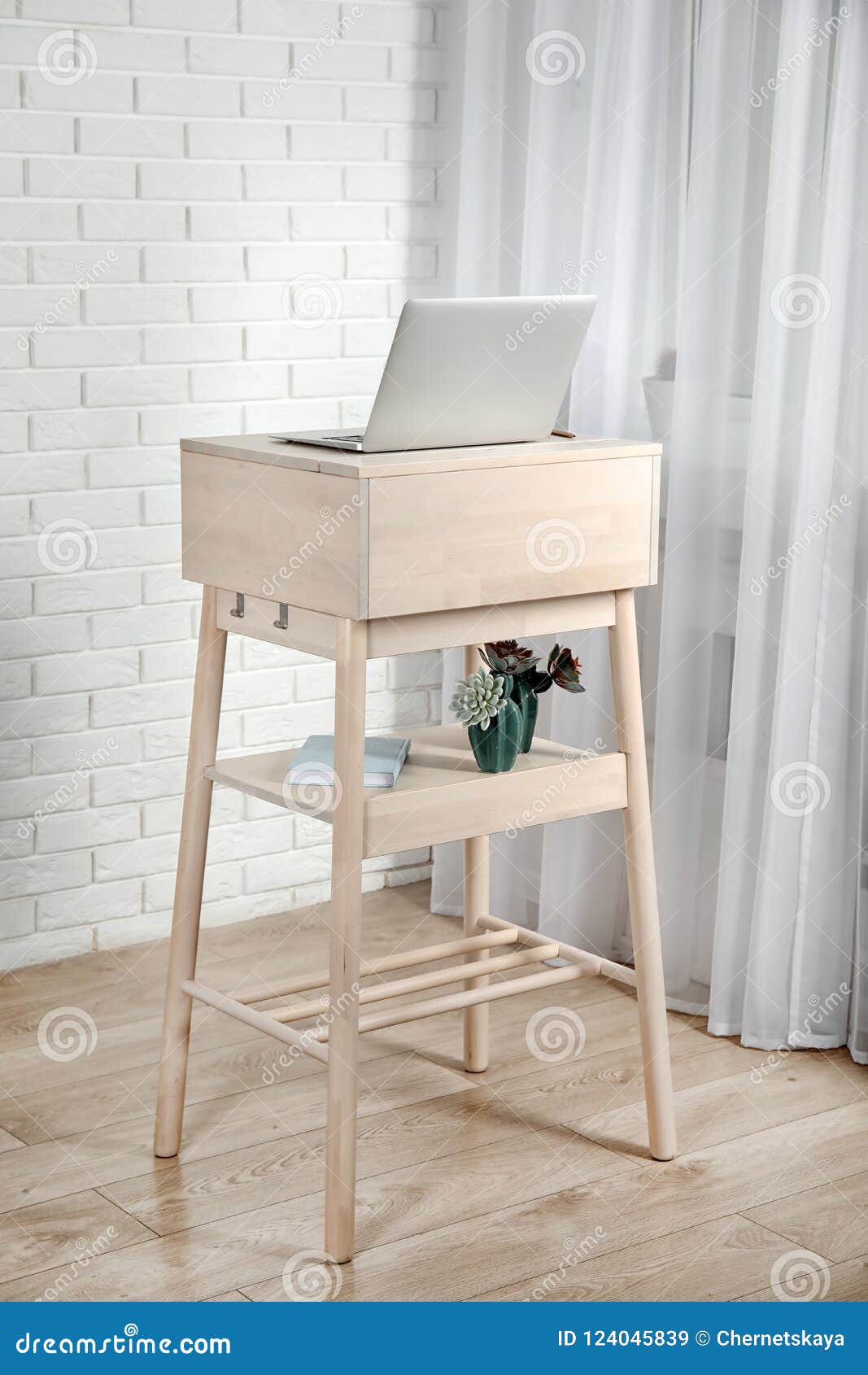 High Wooden Table With Laptop As Stand Up I Stock Image Image Of