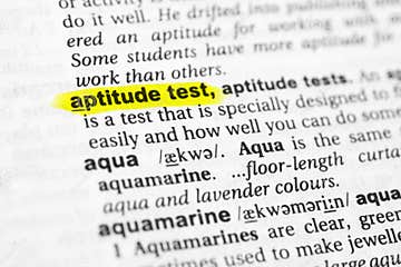 Highlighted English Word aptitude Test And Its Definition In The Dictionary Stock Photo