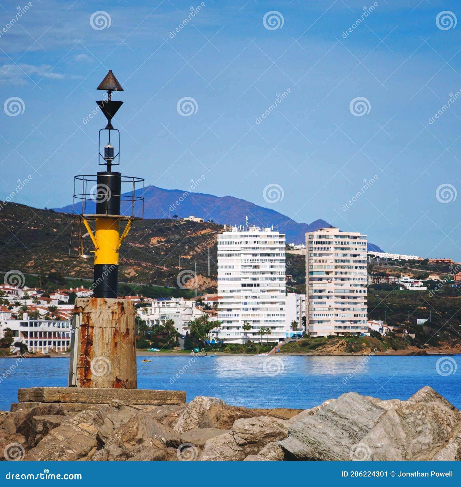 highrise flats on the edge of the beach in sotogrande, spain
