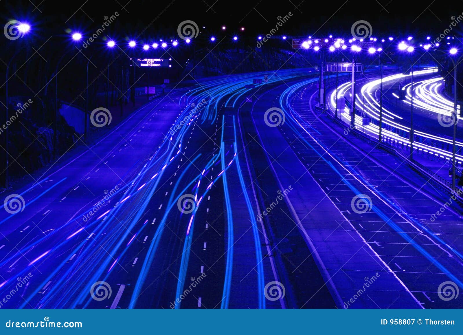 Highway at Night in Blue stock image. Image of center, fast 958807