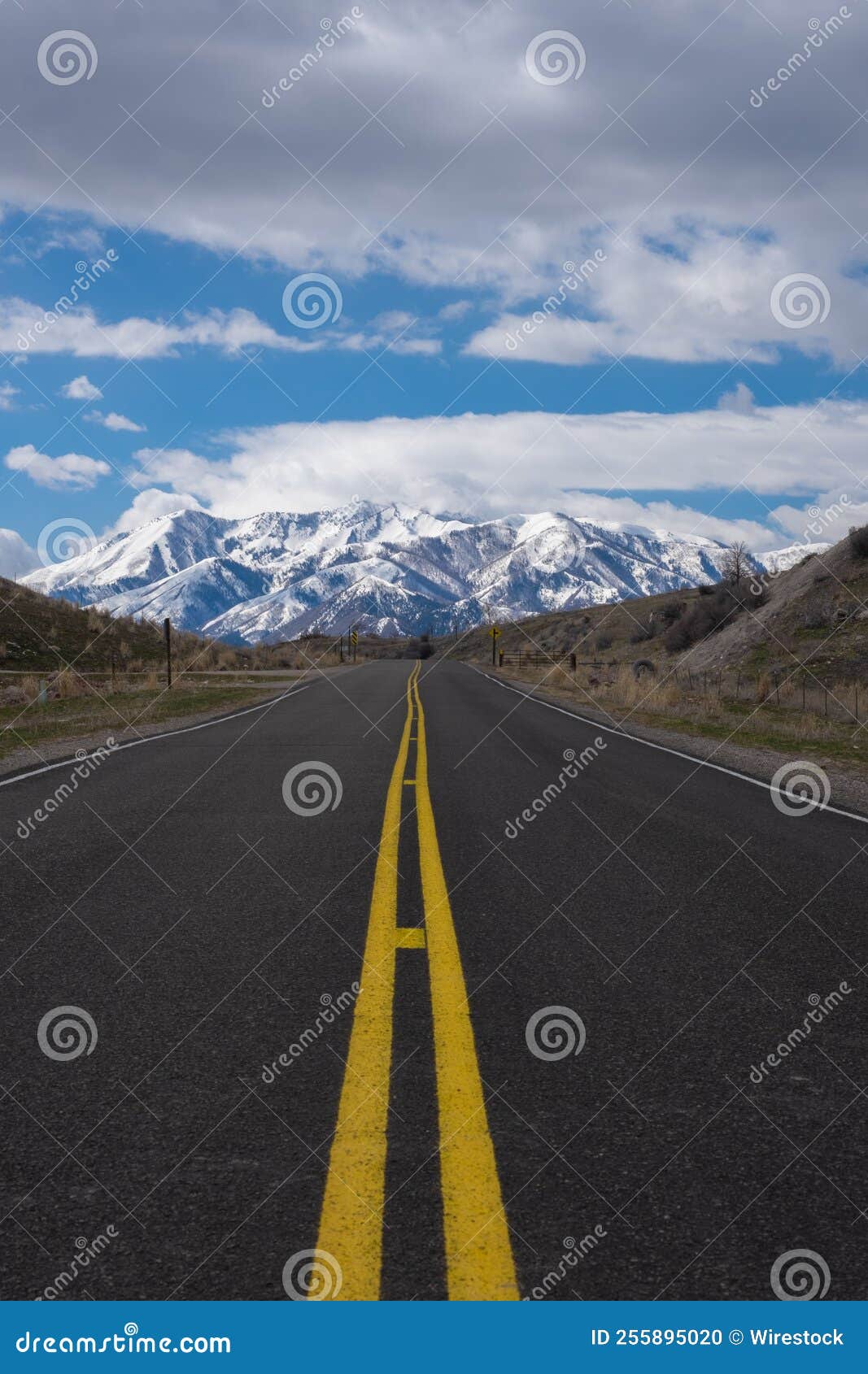 Highway Road Heading Towards a Snowy Mountain Stock Photo Image of