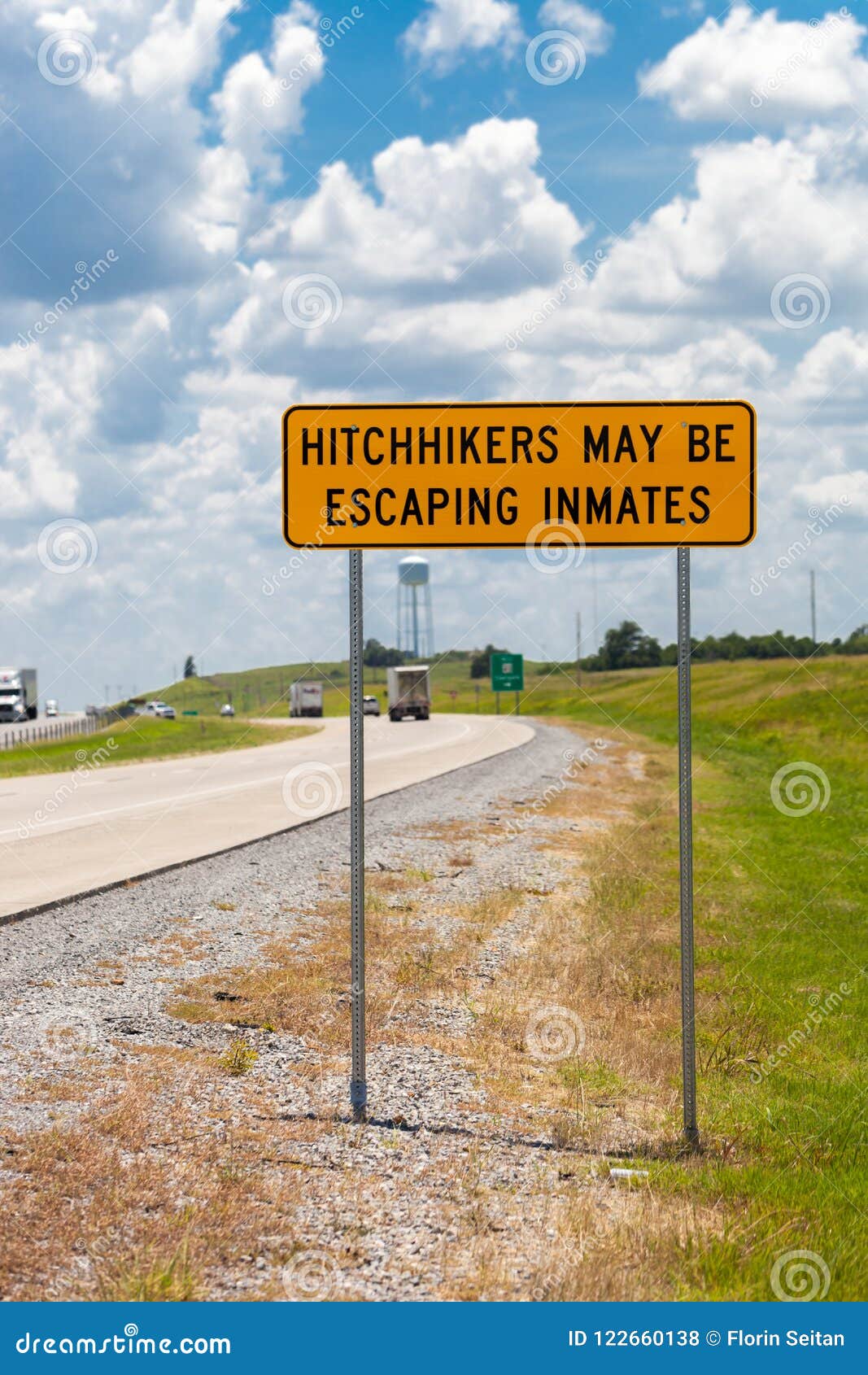 Highway Warning Sign about Hitchhikers that Might Escaping Inmates