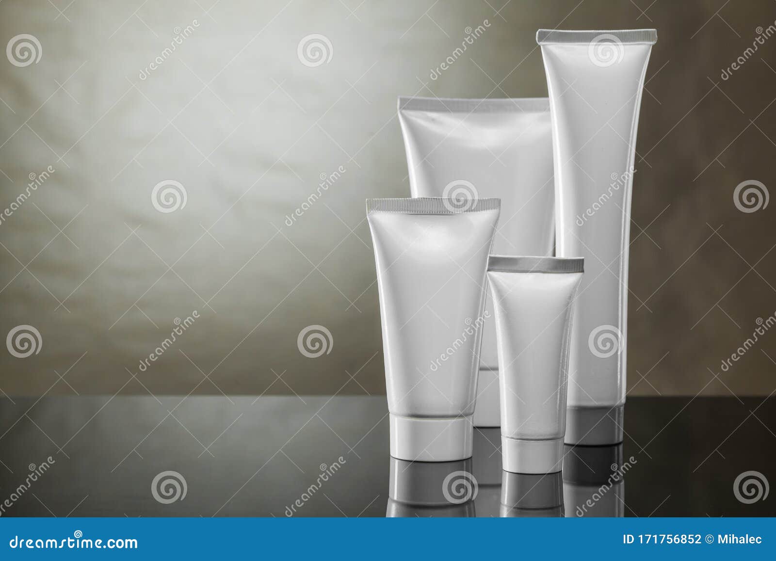 higiene products four white plastic tubes on vintage background