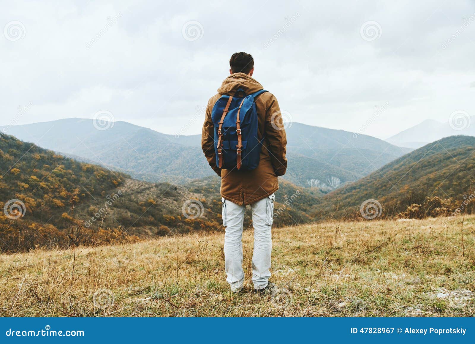 hiker man enjoying by scenics in autumn season