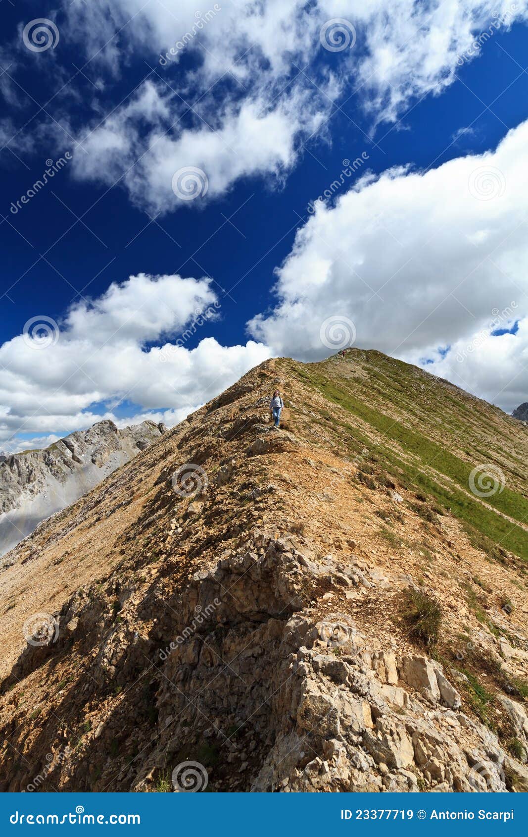 hiker on mountain ridge