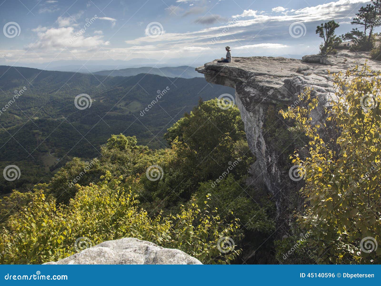 hiker resting on an appalachian trail overlook