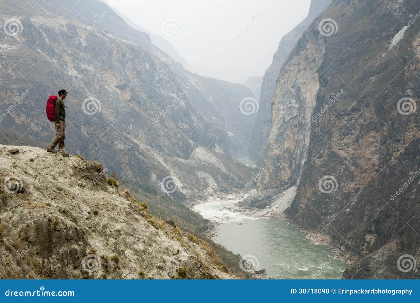 hiker on steep mountain path