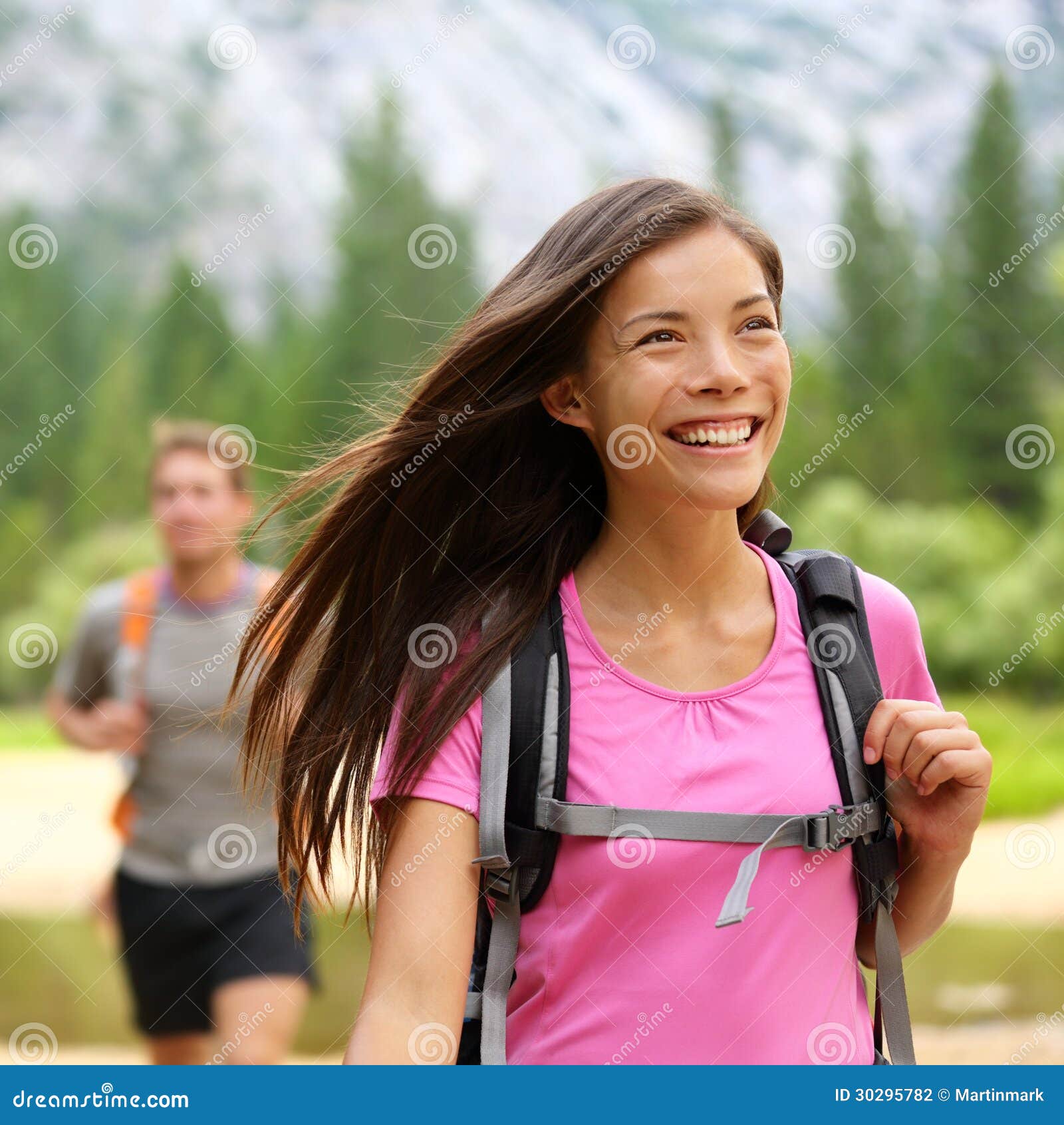 Happy Hiking Woman Giving Thumbs Up Smiling. Young Hiker Woman