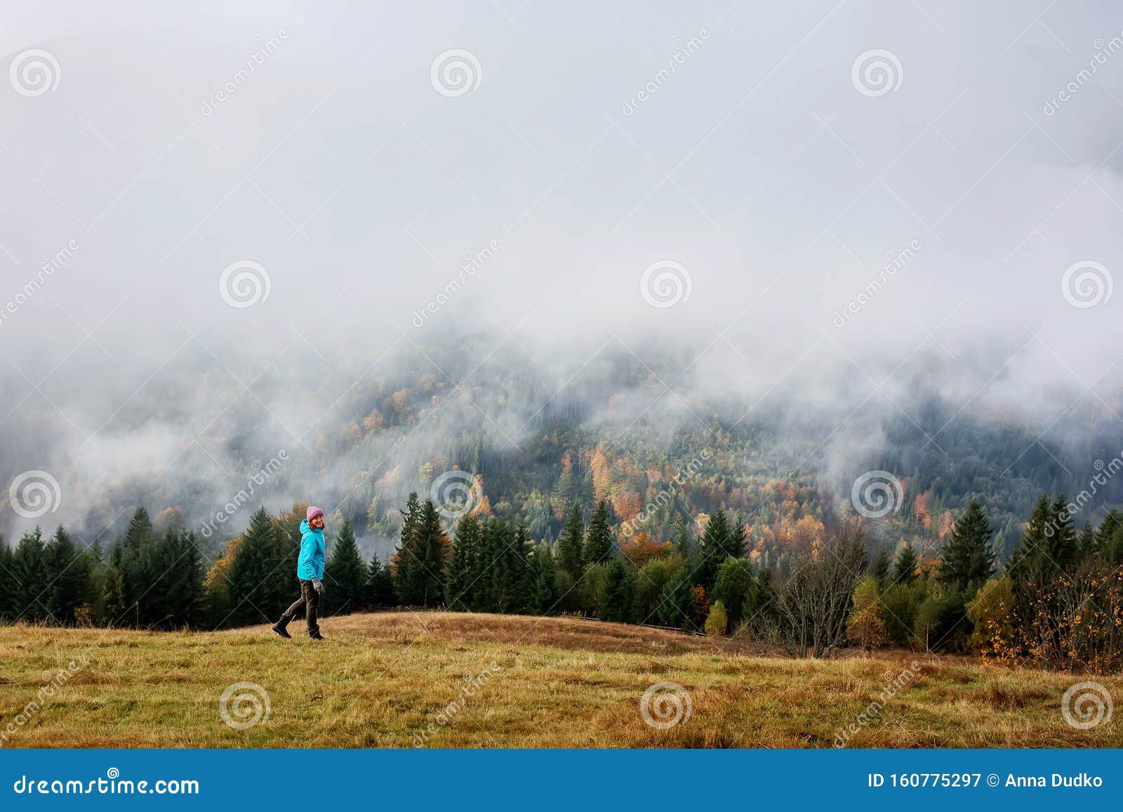 hiker woman in moumtains in autumn