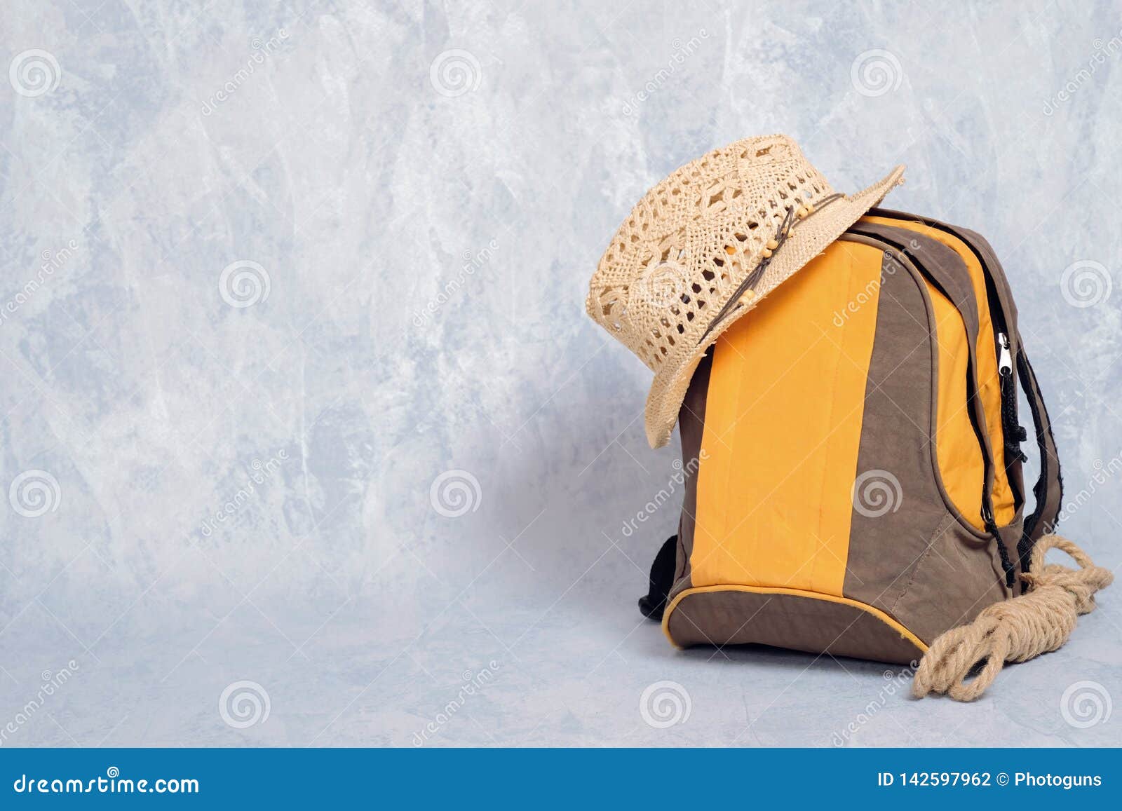 Download Hiking Backpack With Rope And Straw Hat On Grey Background, Banner Mockup With Copy Space For ...