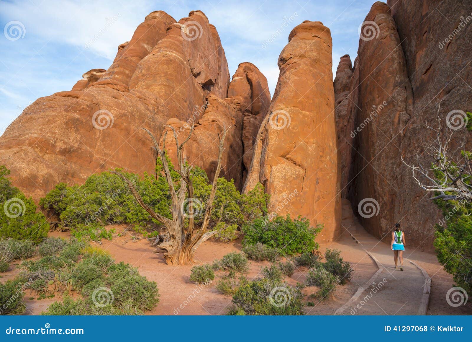 hiking girl on the sand dune arch trail