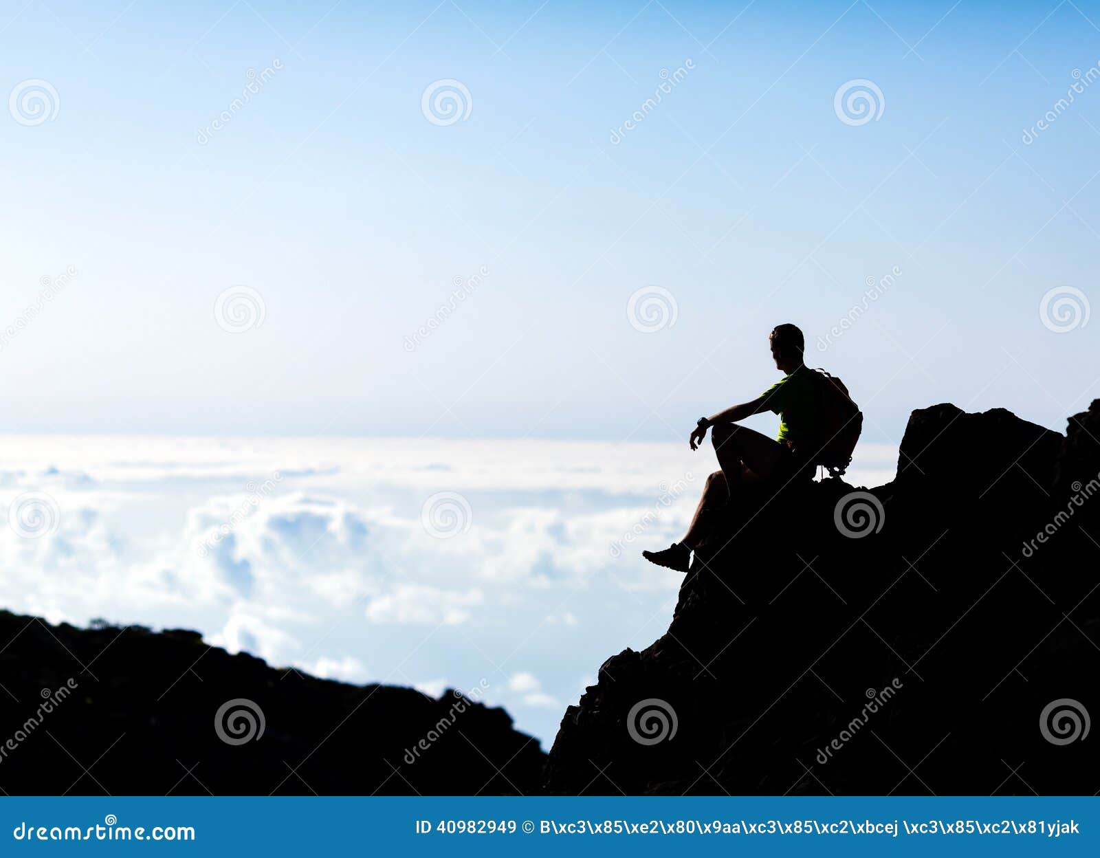 hiking silhouette backpacker, man trail runner in mountains