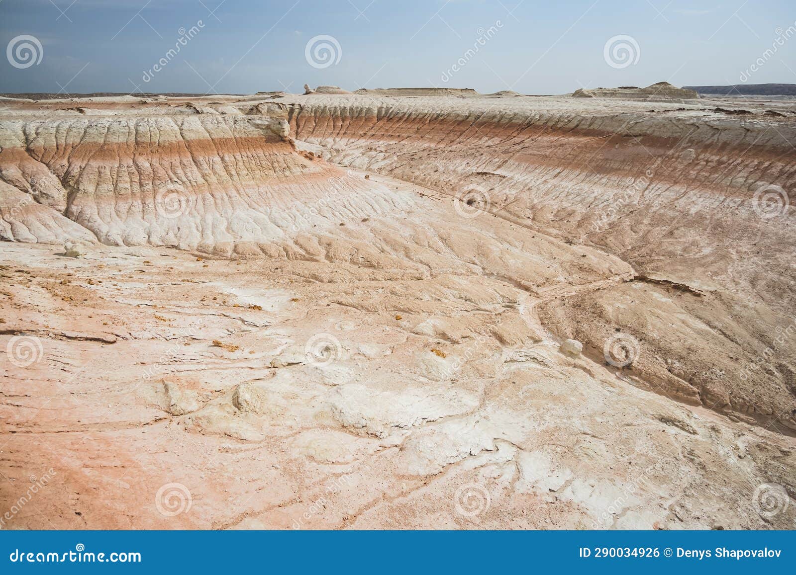 hills of chalk and limestone and slopes of multi-colored mountains with weathering and washouts from water