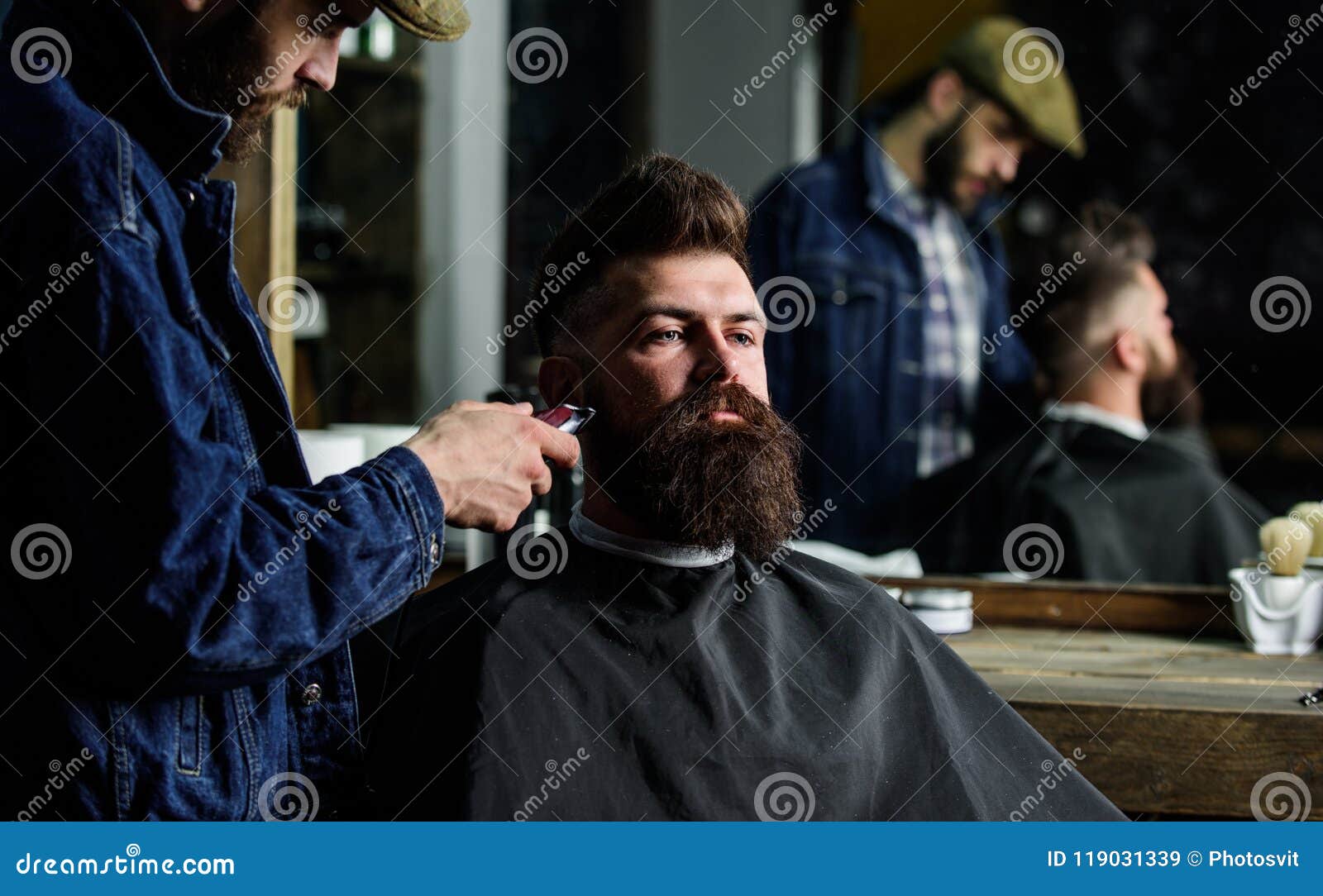 Hipster with Beard Covered with Cape Trimming by Professional Barber in ...