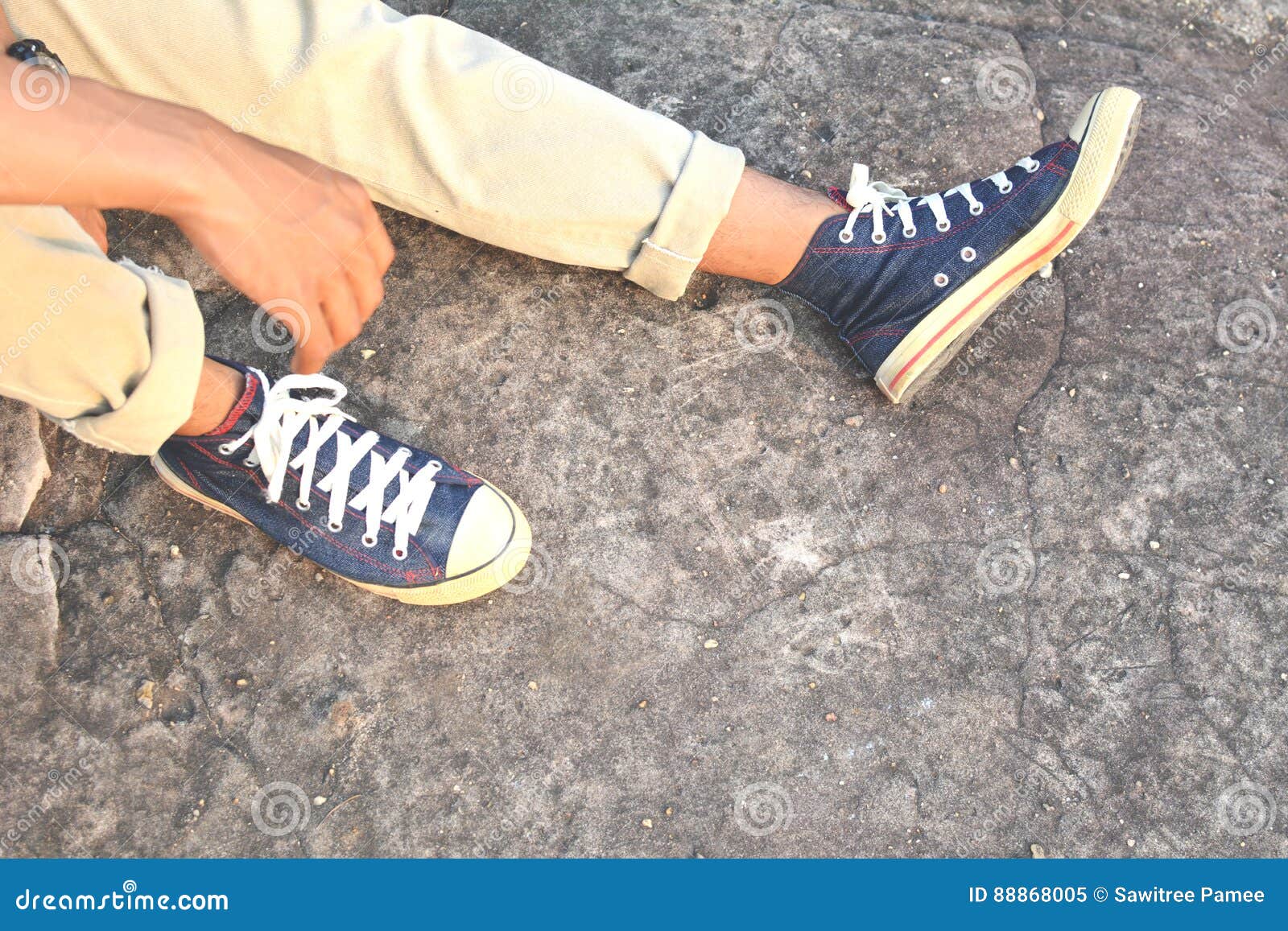 Hipster Feet a Man and Jeans Sneaker in Nature Stock Image - Image of ...