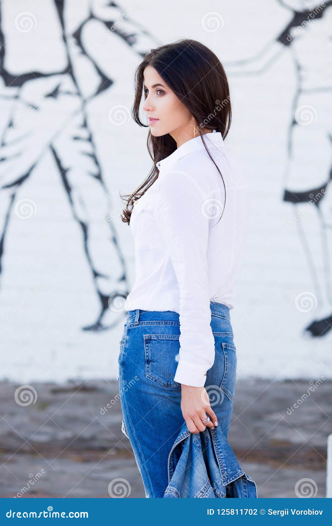 Hipster Girl Wearing Blank White Shirt, Jeans and Jeans Jacket Posing ...