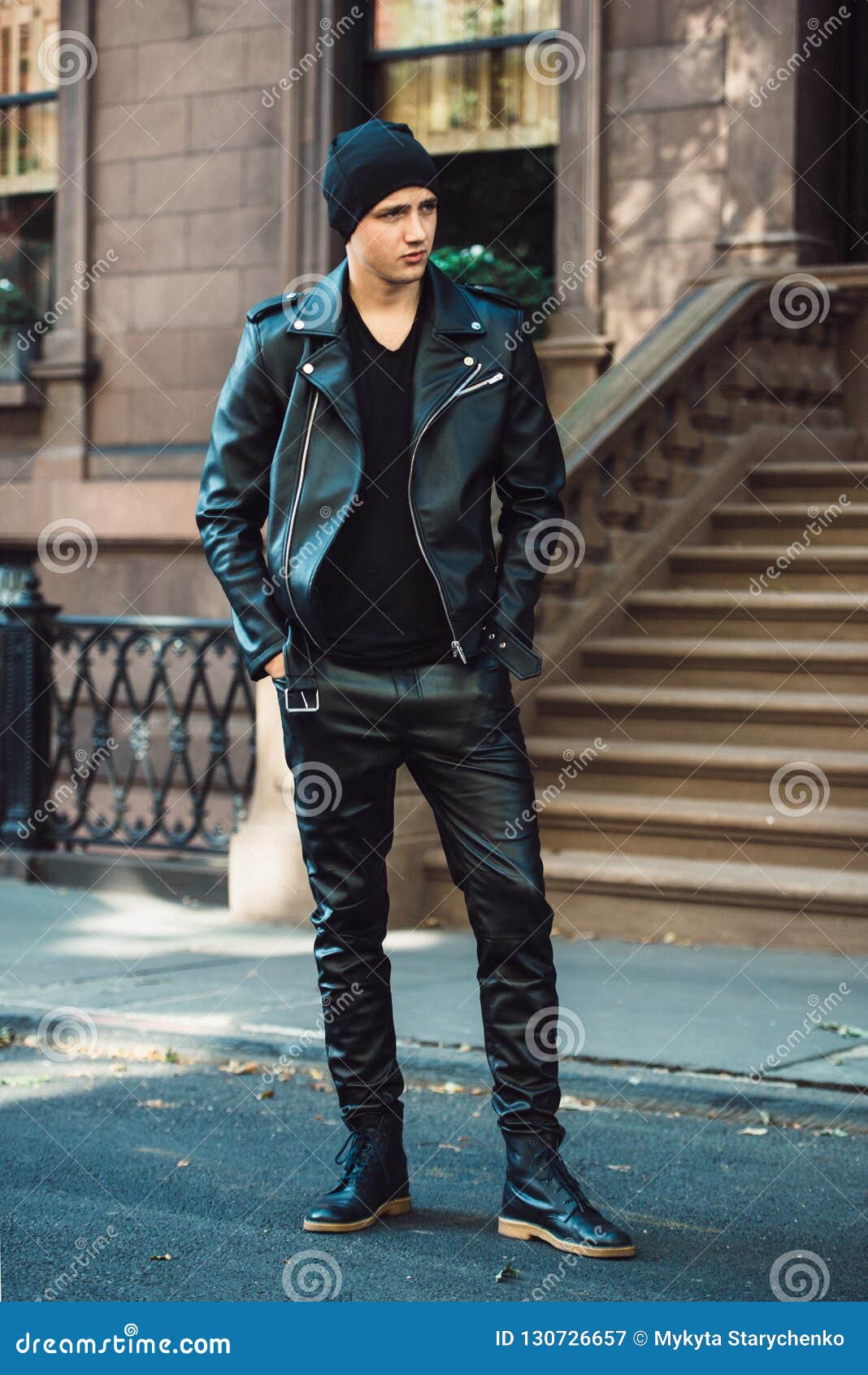 Hipster Man Wearing Black Style Leather Outfit with Hat, Pants, Jacket and  Shoes Standing on City Street. Stock Image - Image of brunet, face:  130726657