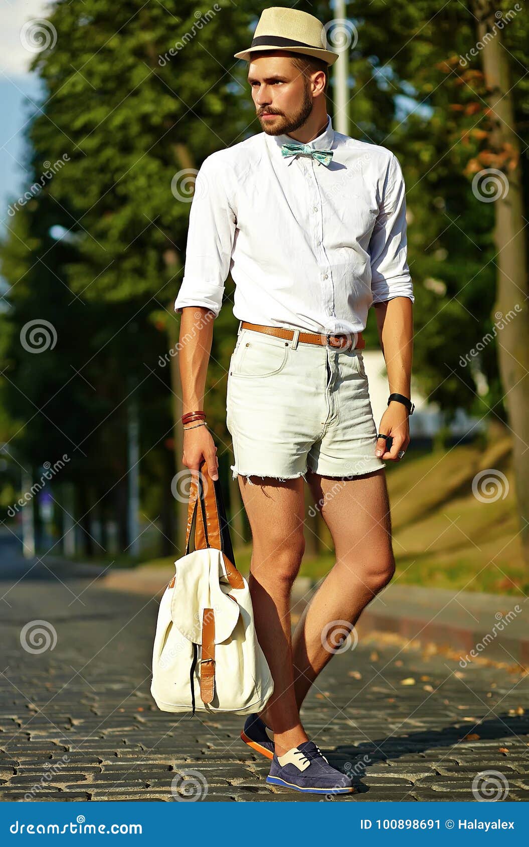 Hipster Model Man In Stylish Summer Clothes Posing On Street Background ...