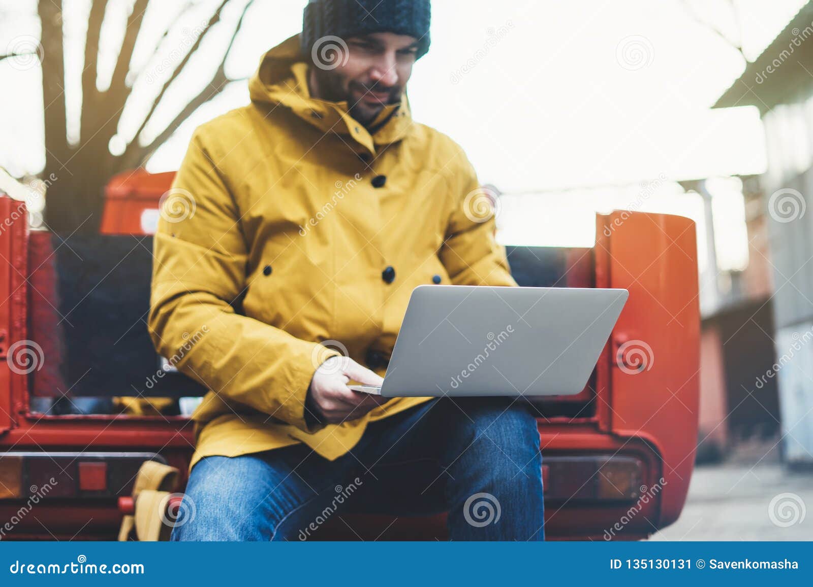 Hipster with Yellow Backpack, Jacket and Cap Sitting on Retro Red Car ...