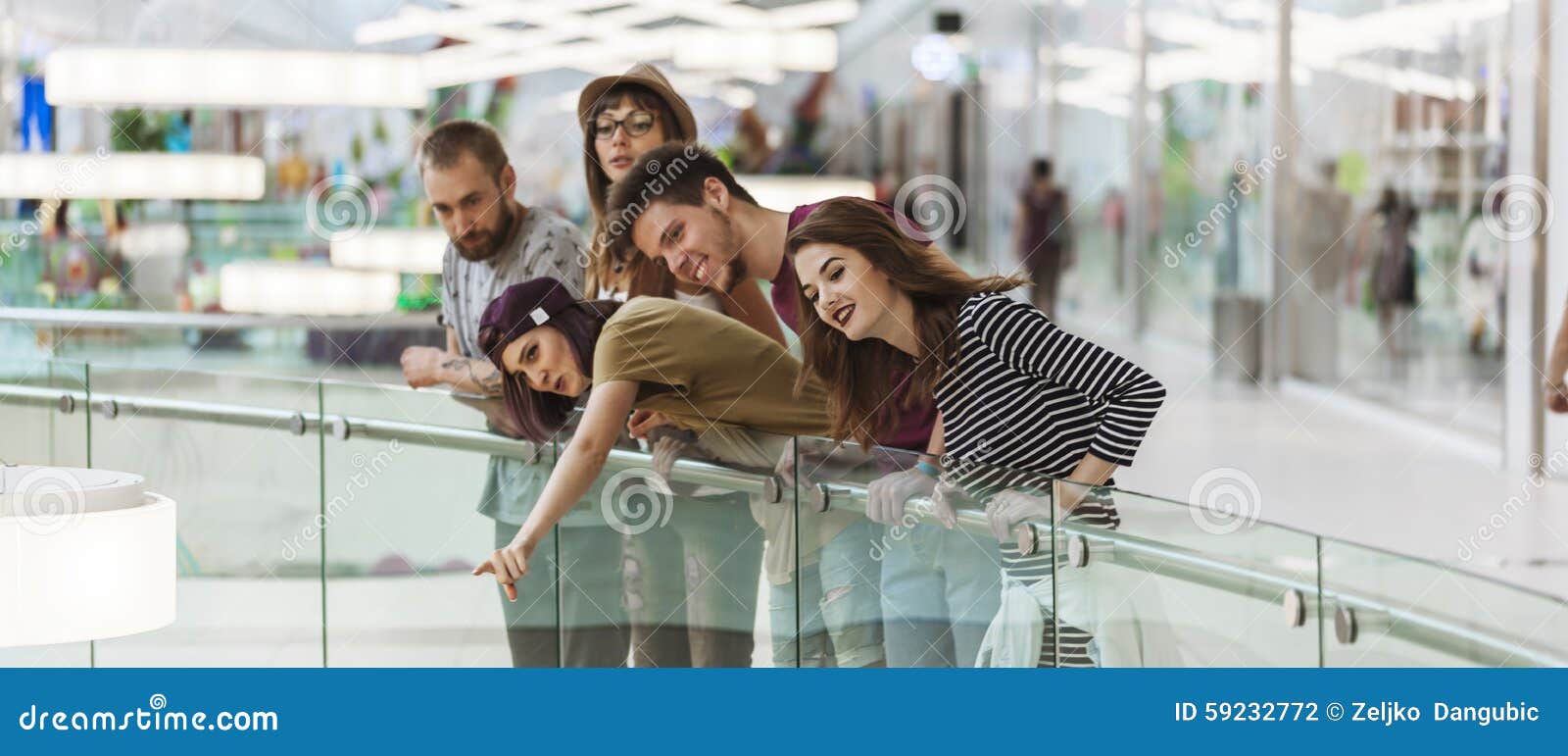 Hipsters in Shopping Mall stock photo. Image of plaza 59232772