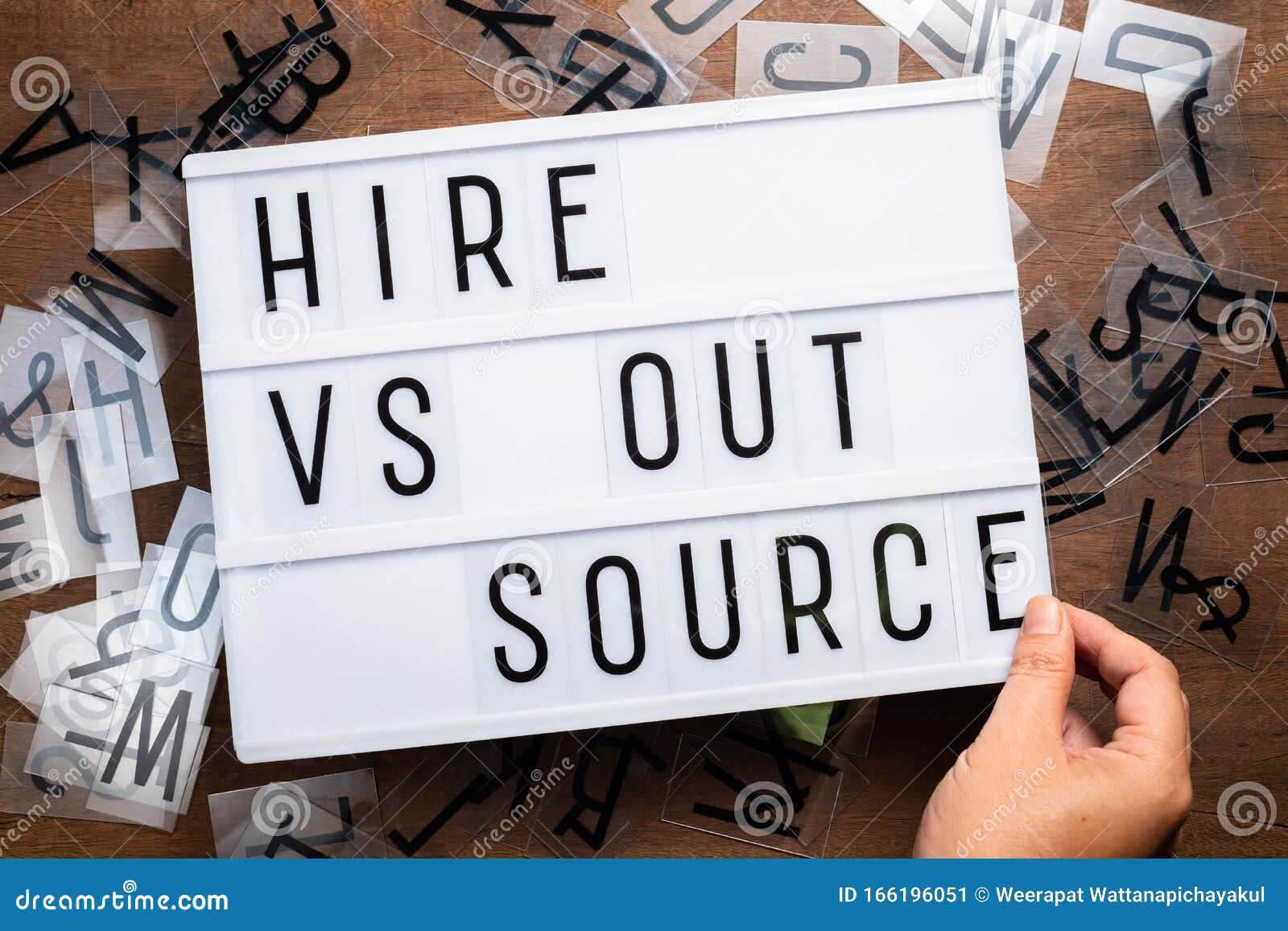 hire versus outsource