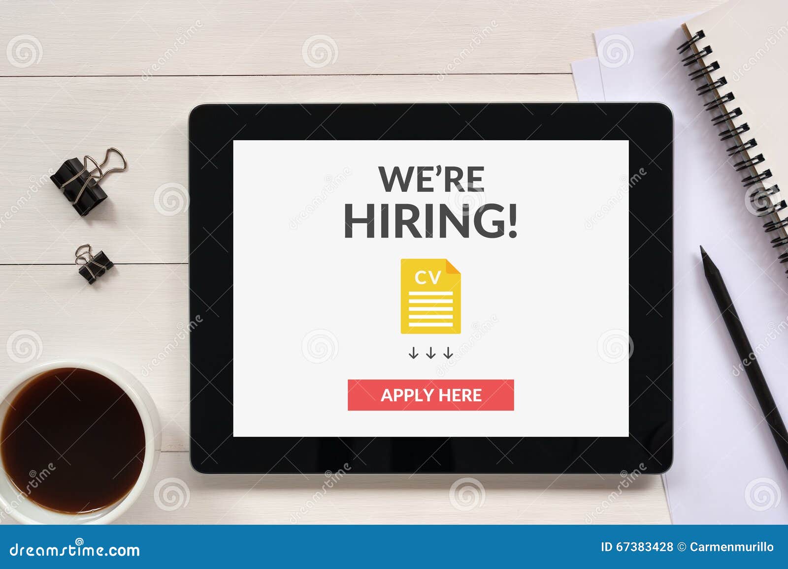 we are hiring apply now concept on tablet screen with office obj