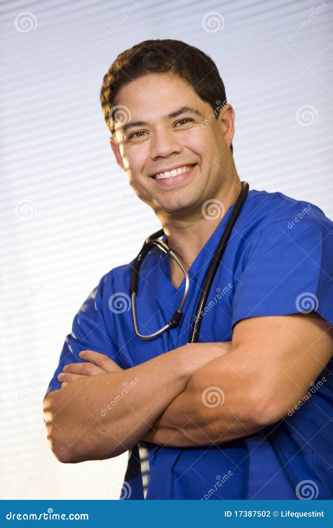 Hispanic Male Wearing Scrubs Stock Photo Image of clipboard, occupation 17387502