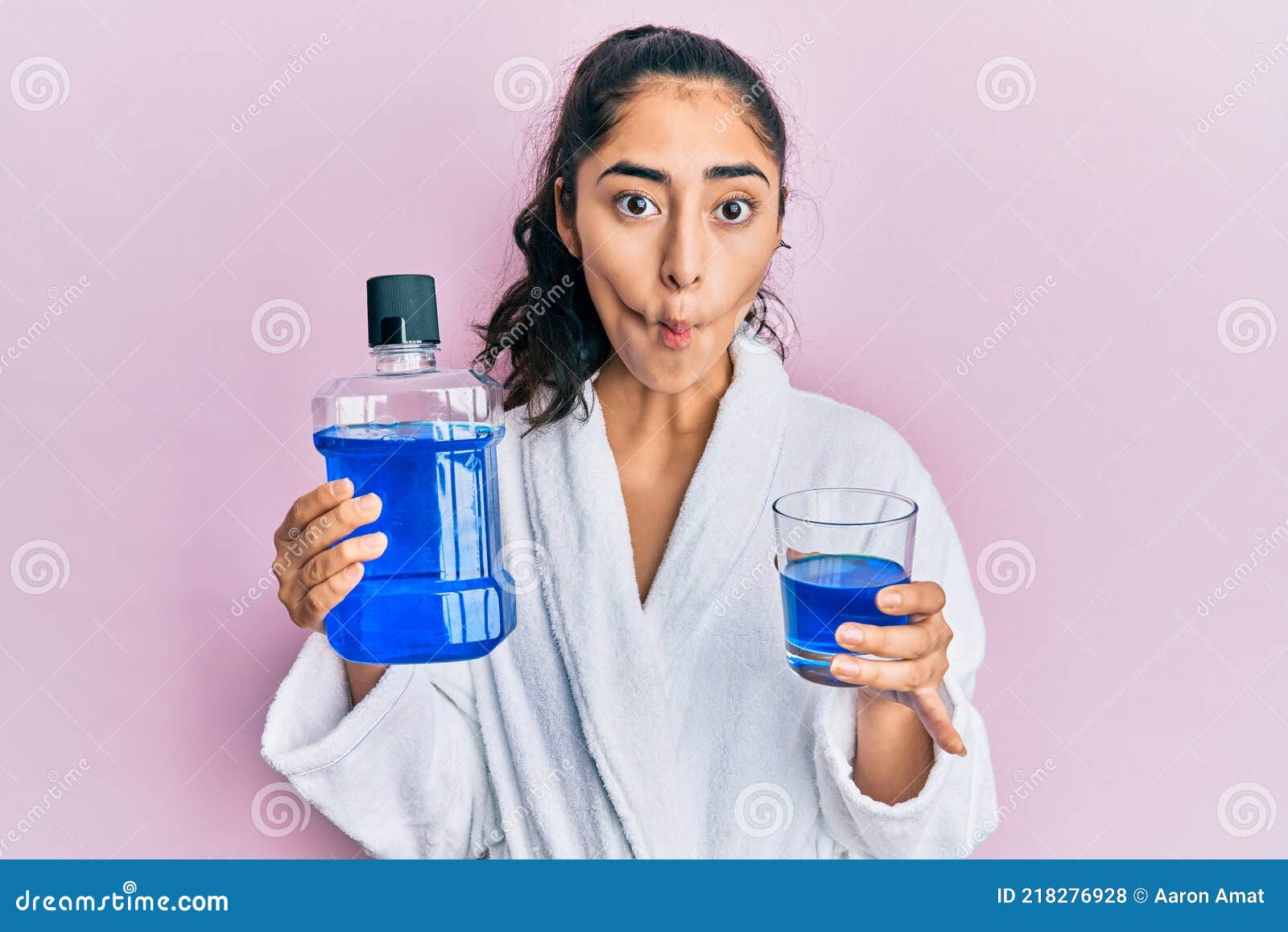 Hispanic Teenager Girl with Dental Braces Holding Mouthwash Making Fish  Face with Mouth and Squinting Eyes, Crazy and Comical Stock Photo - Image  of bracket, happy: 218276928