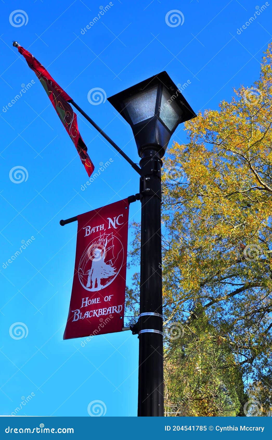 Bath, North Carolina Lightpost and Flags Editorial Image - Image of
