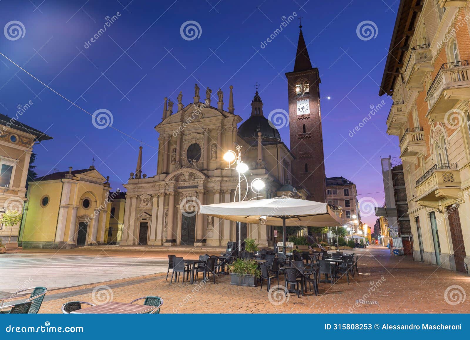 historic center of an italian city at dawn with outdoor bars, busto arsizio