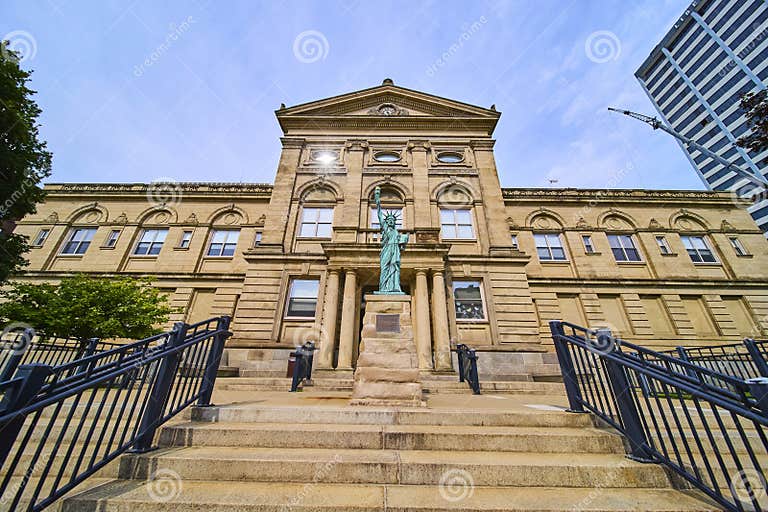 Historic Courthouse Facade with Statue of Liberty Replica in Low Historic Courthouse Facade with Statue of Liberty Replica in Low